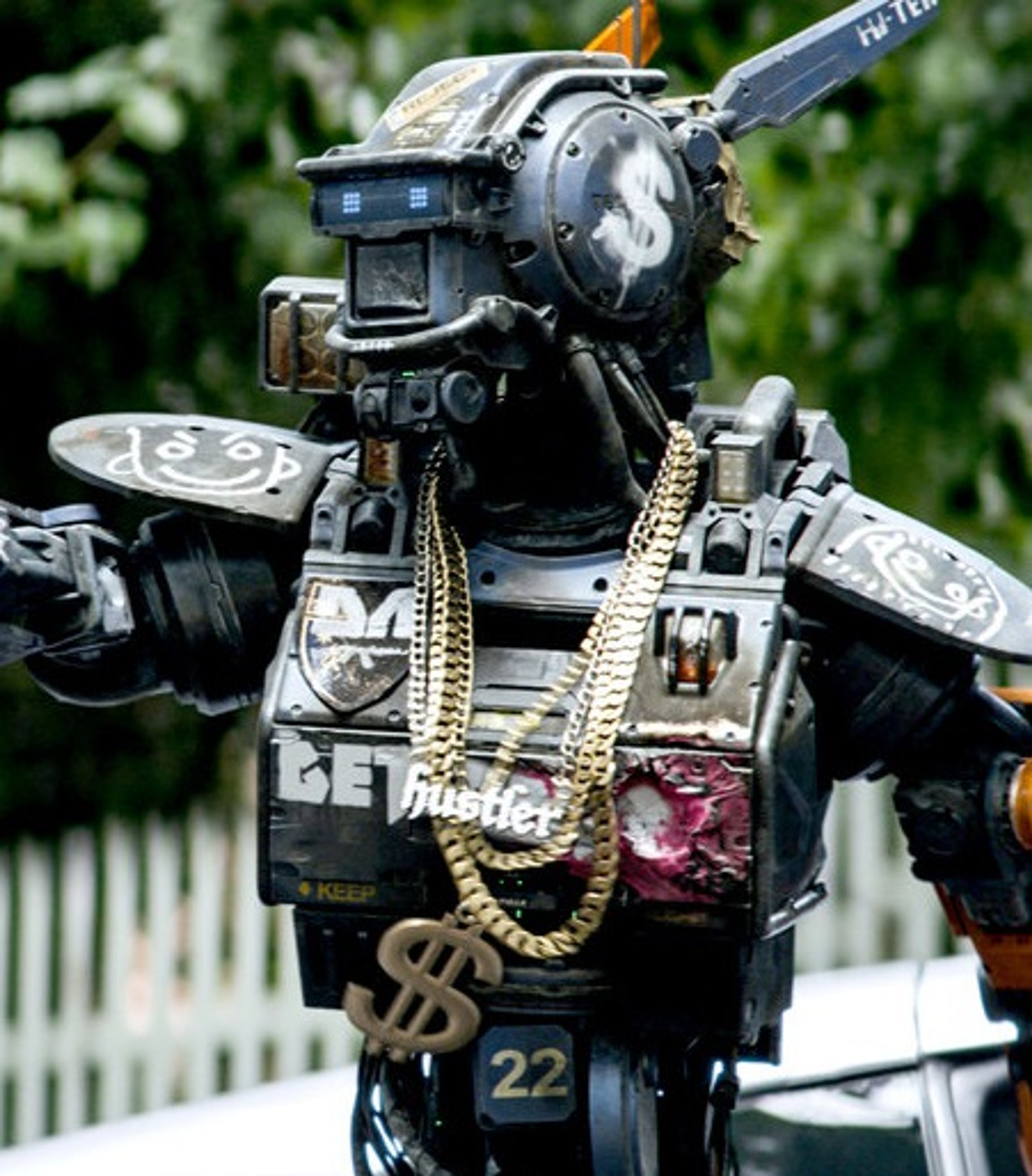 A heavily armored and mechanical robotic character with a large, bulky frame and various technological components.