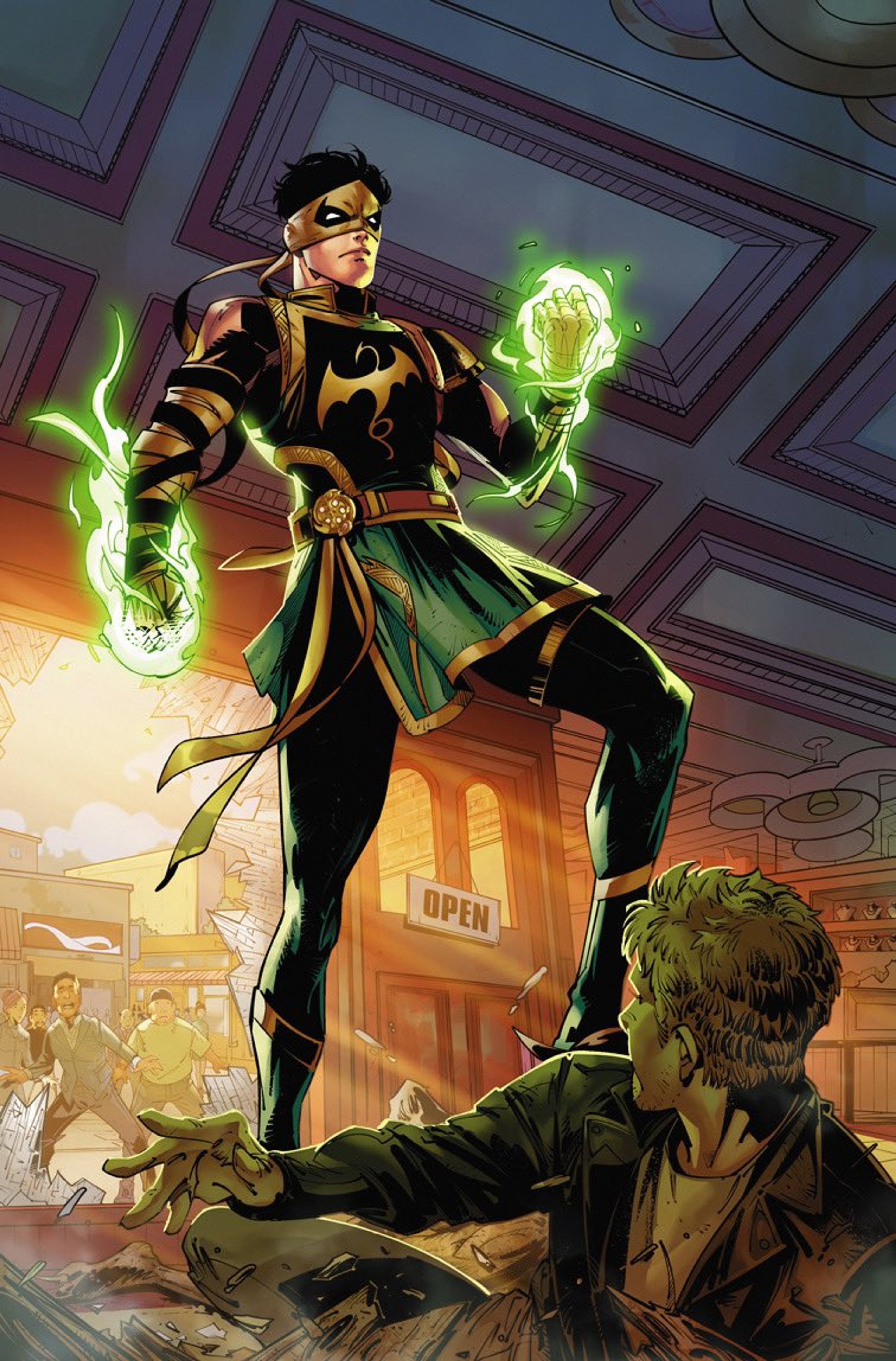 A young Asian man in a martial arts-inspired costume holding a glowing green energy ball