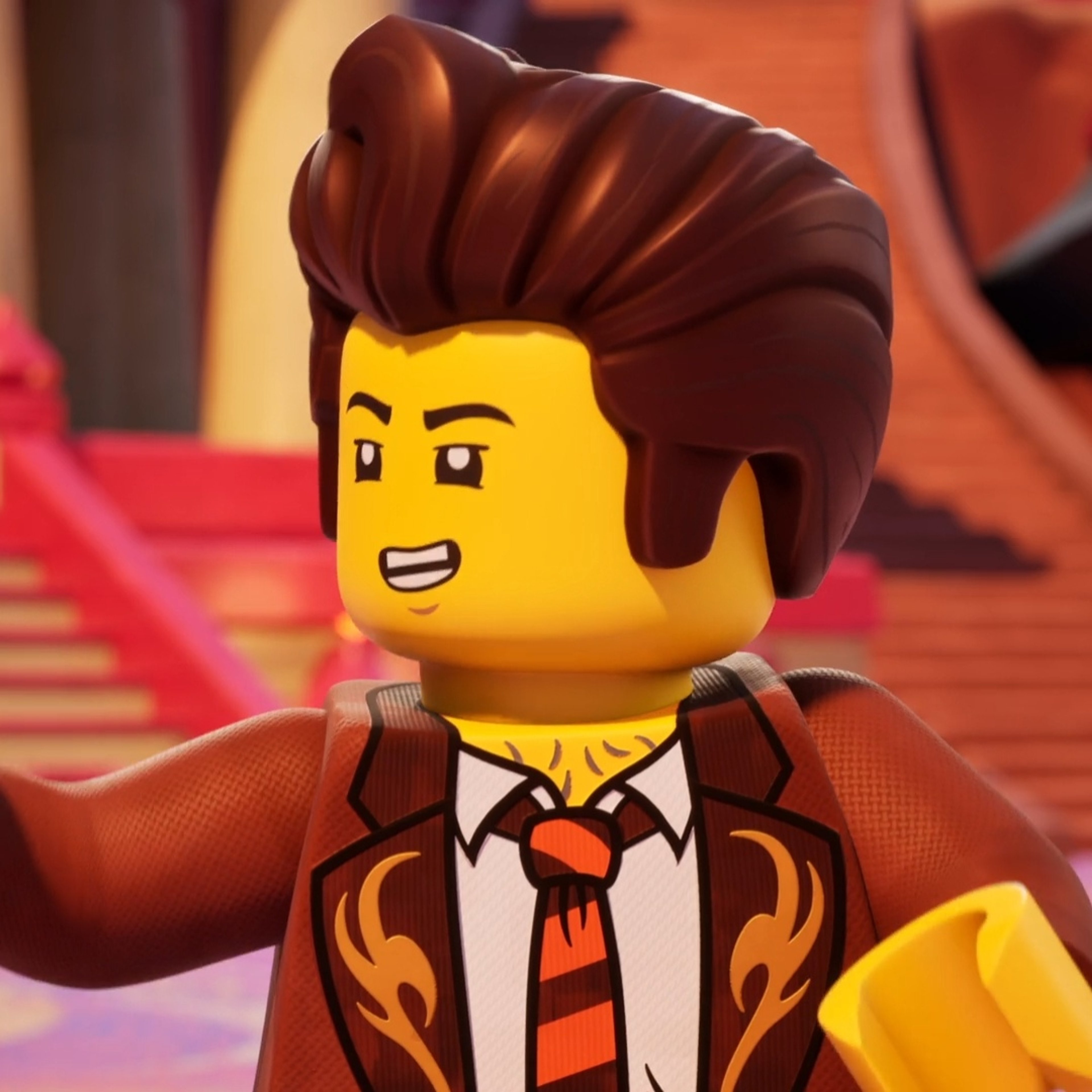 A Lego minifigure character with a brown pompadour hairstyle, wearing a brown martial arts gi with a star emblem on the back.