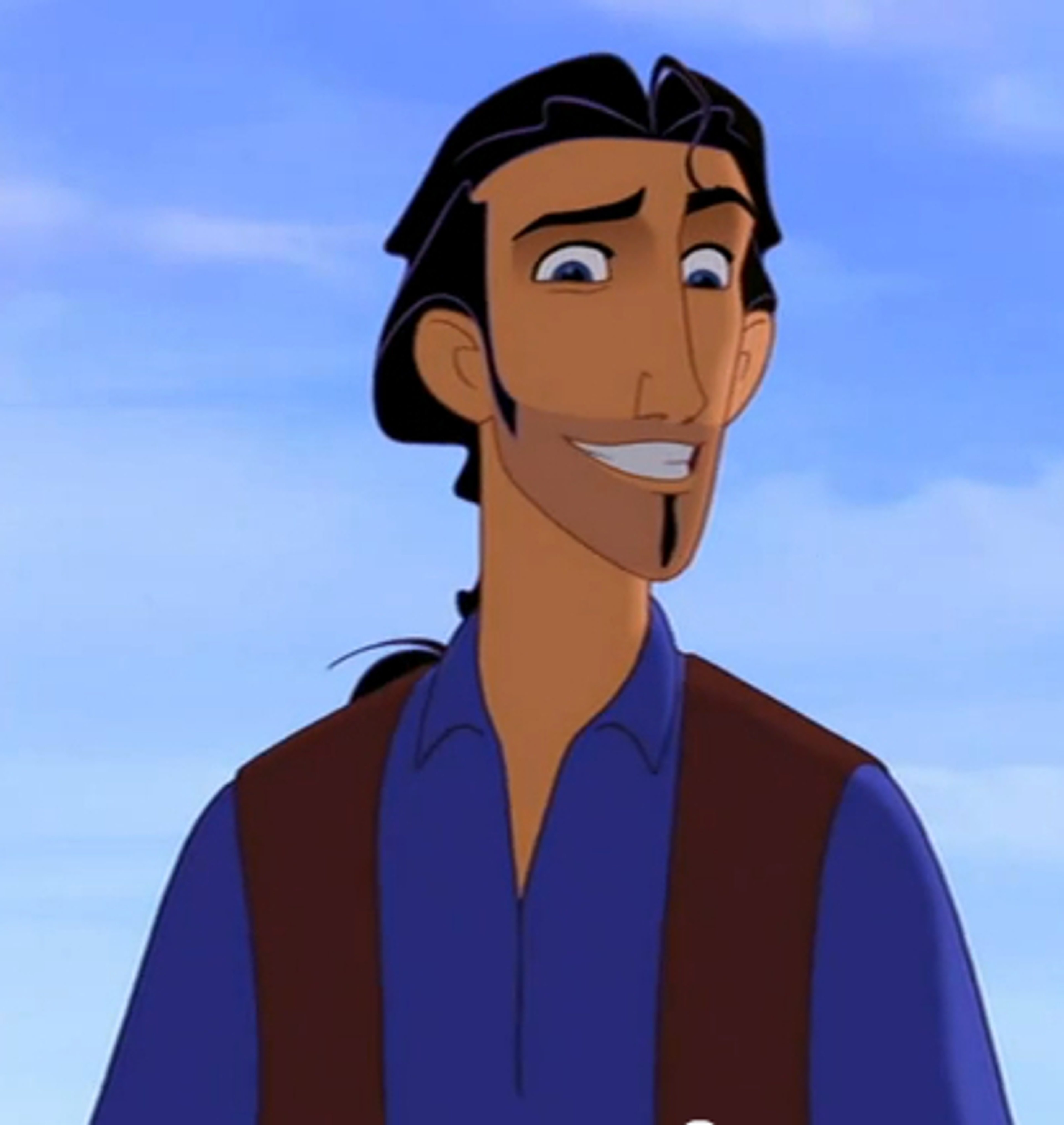 A young, handsome man with long, wavy black hair tied back, wearing a blue and red striped shirt.