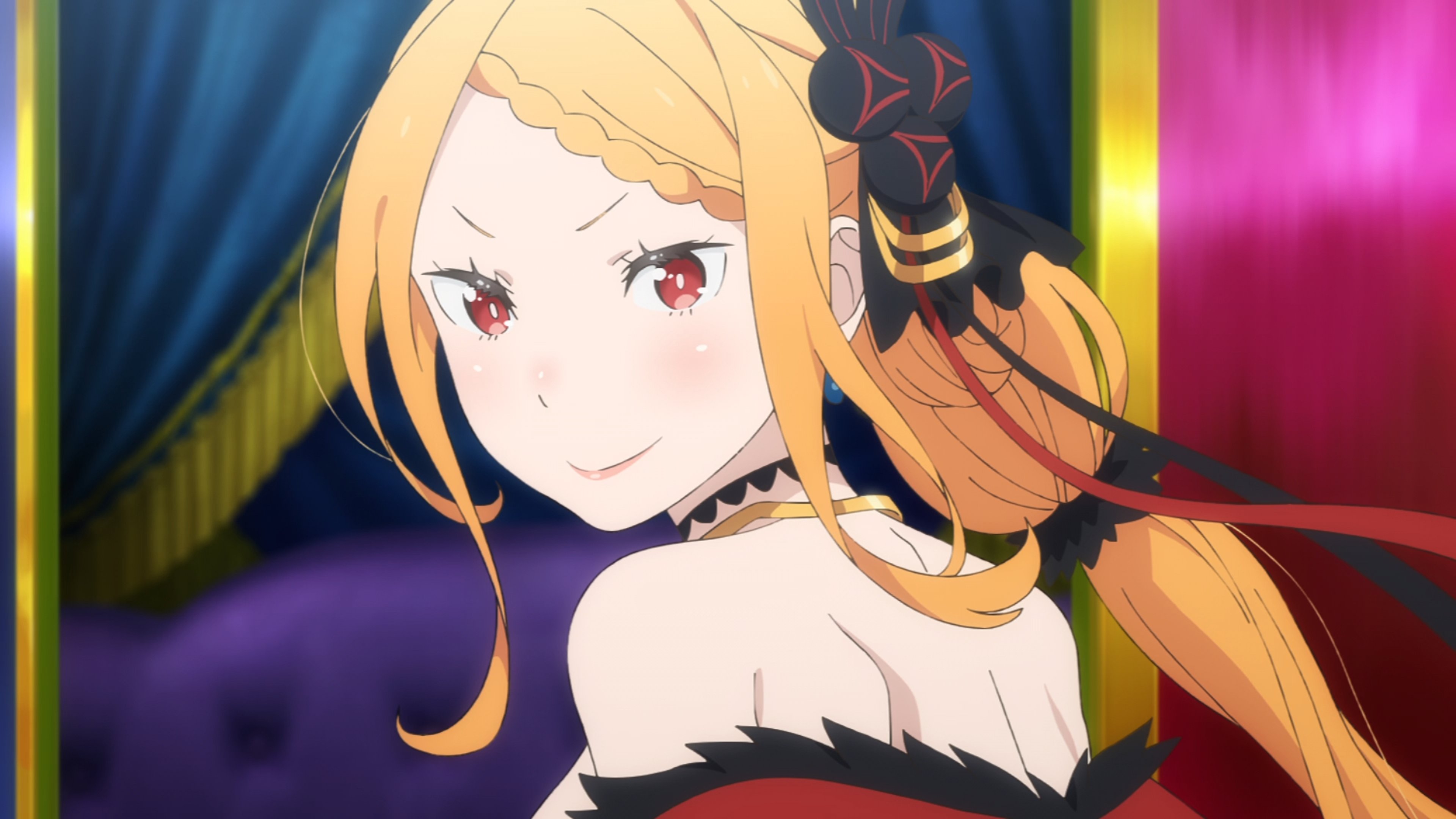 A young woman with long orange hair and crimson eyes, wearing an ornate outfit and carrying herself with an air of arrogance.