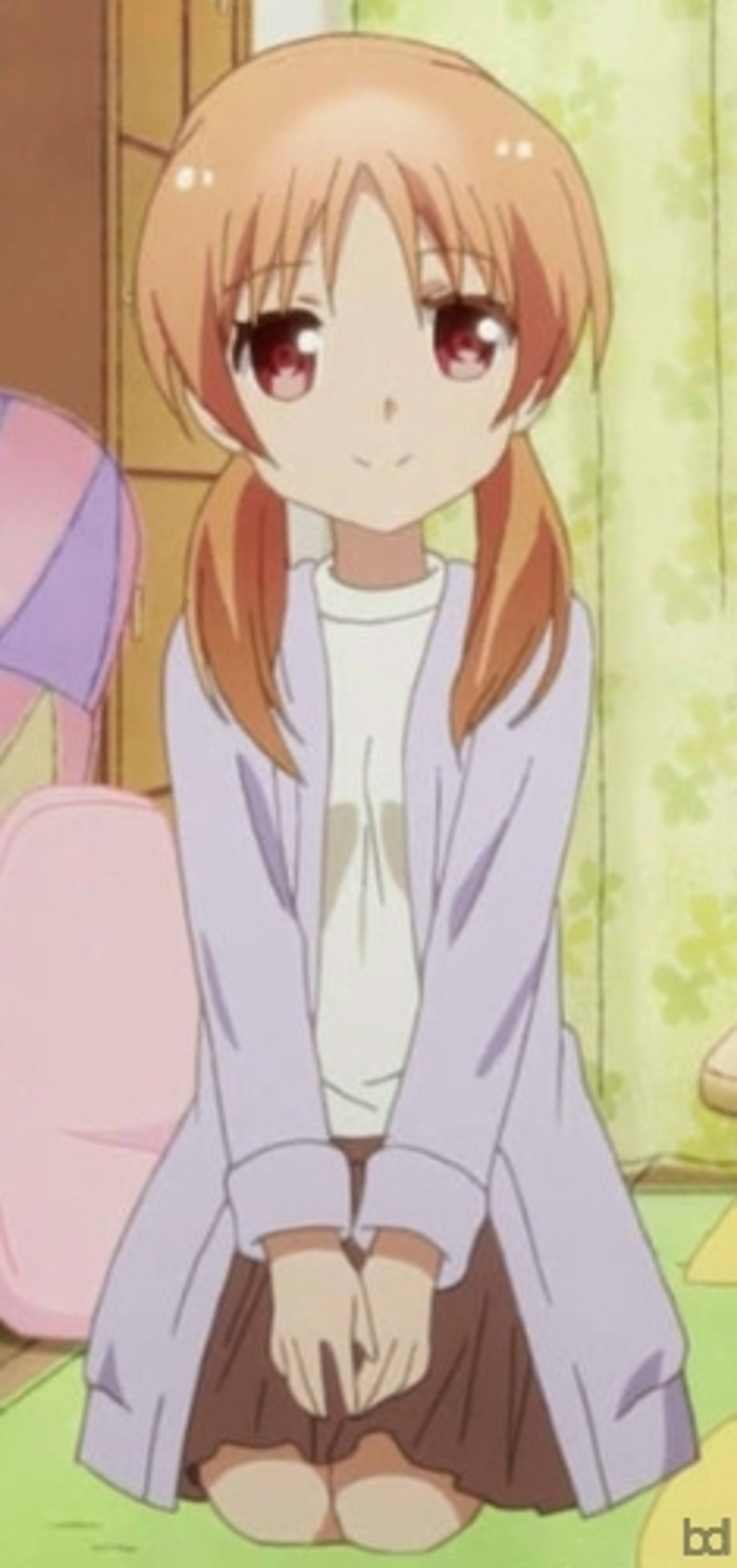 An anime-style character with peach-colored hair in pigtails