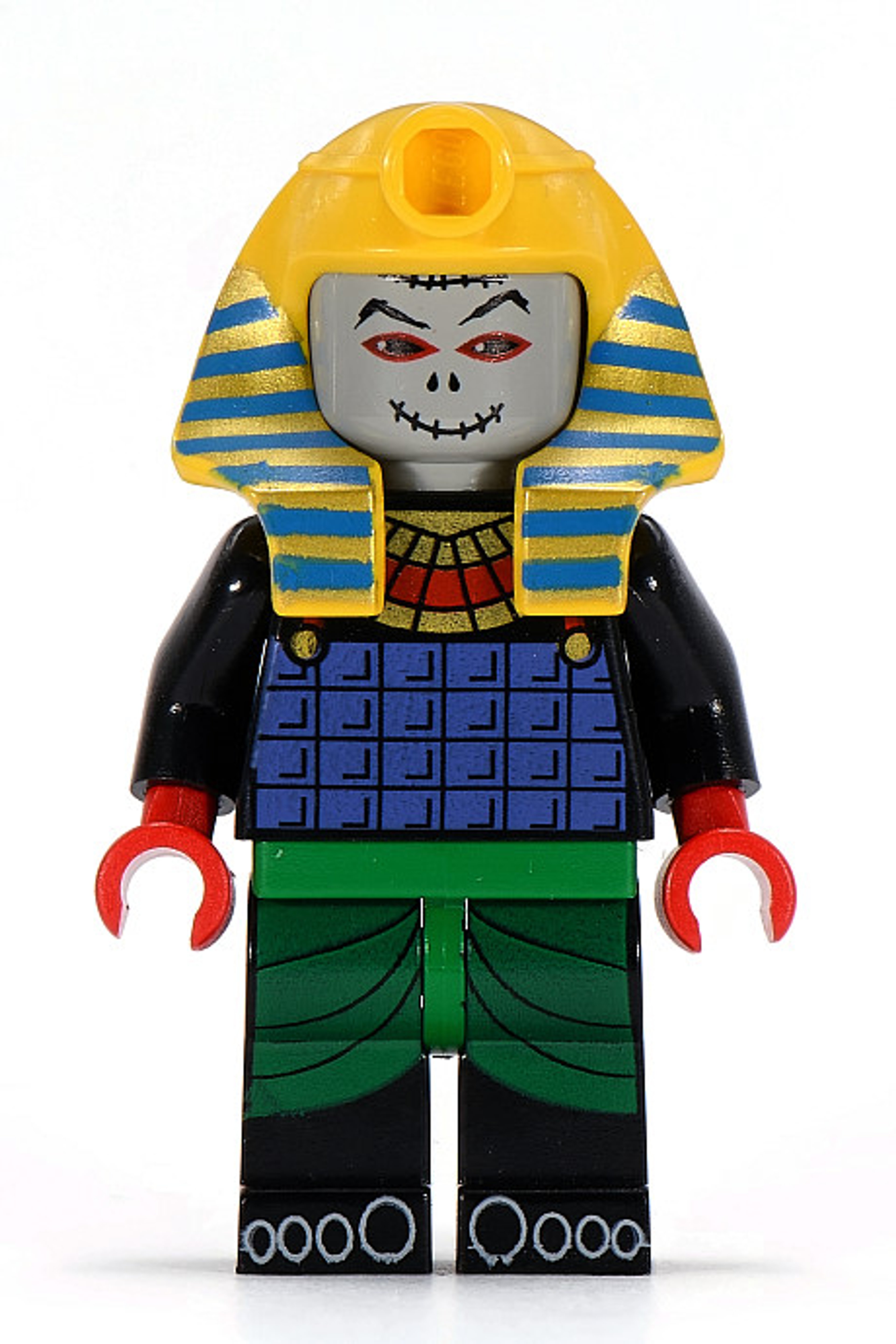 A Lego minifigure of a pharaoh-like character with a menacing expression