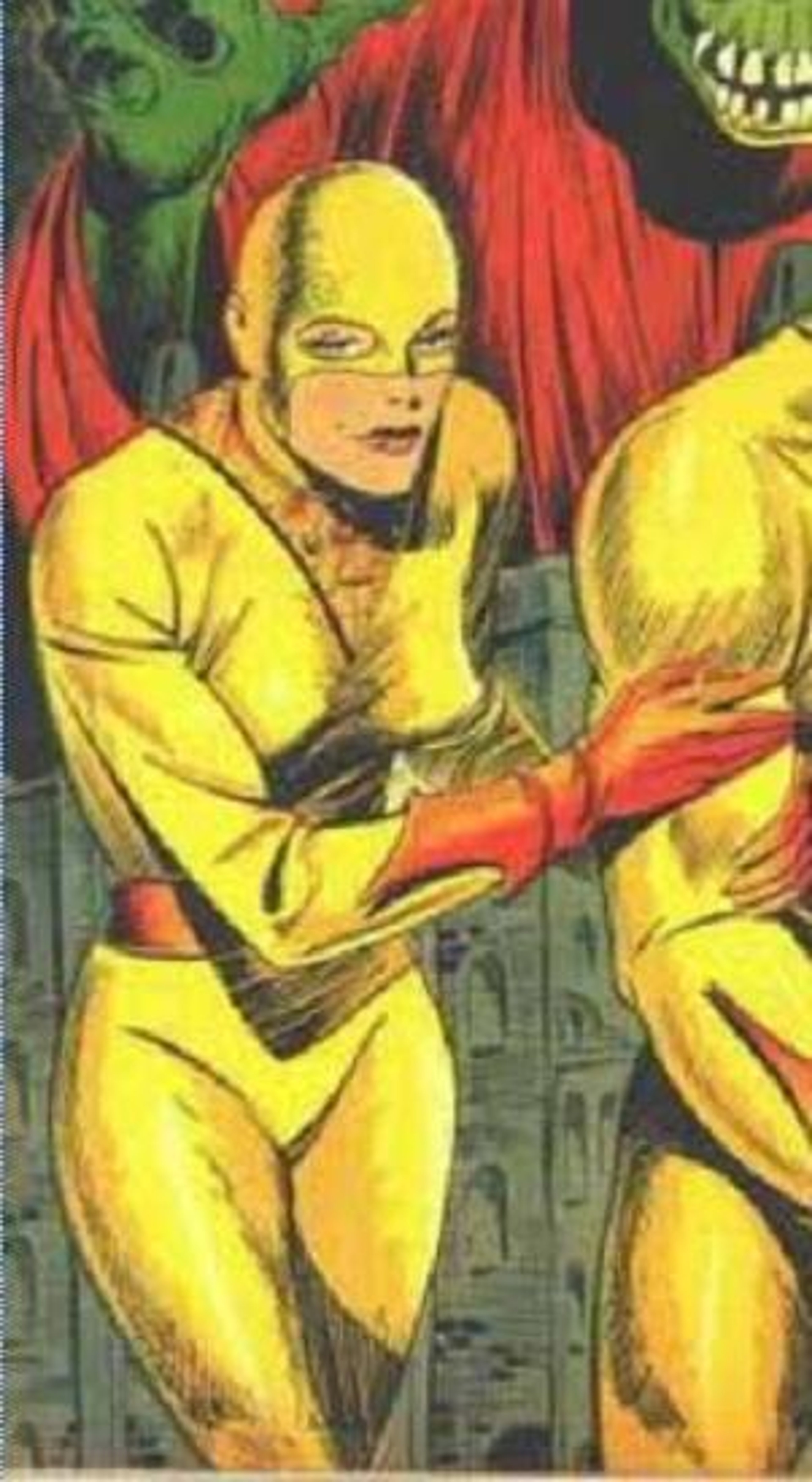 A muscular, yellow-skinned male character in a fighting stance with a red cape and a large, toothy grin.