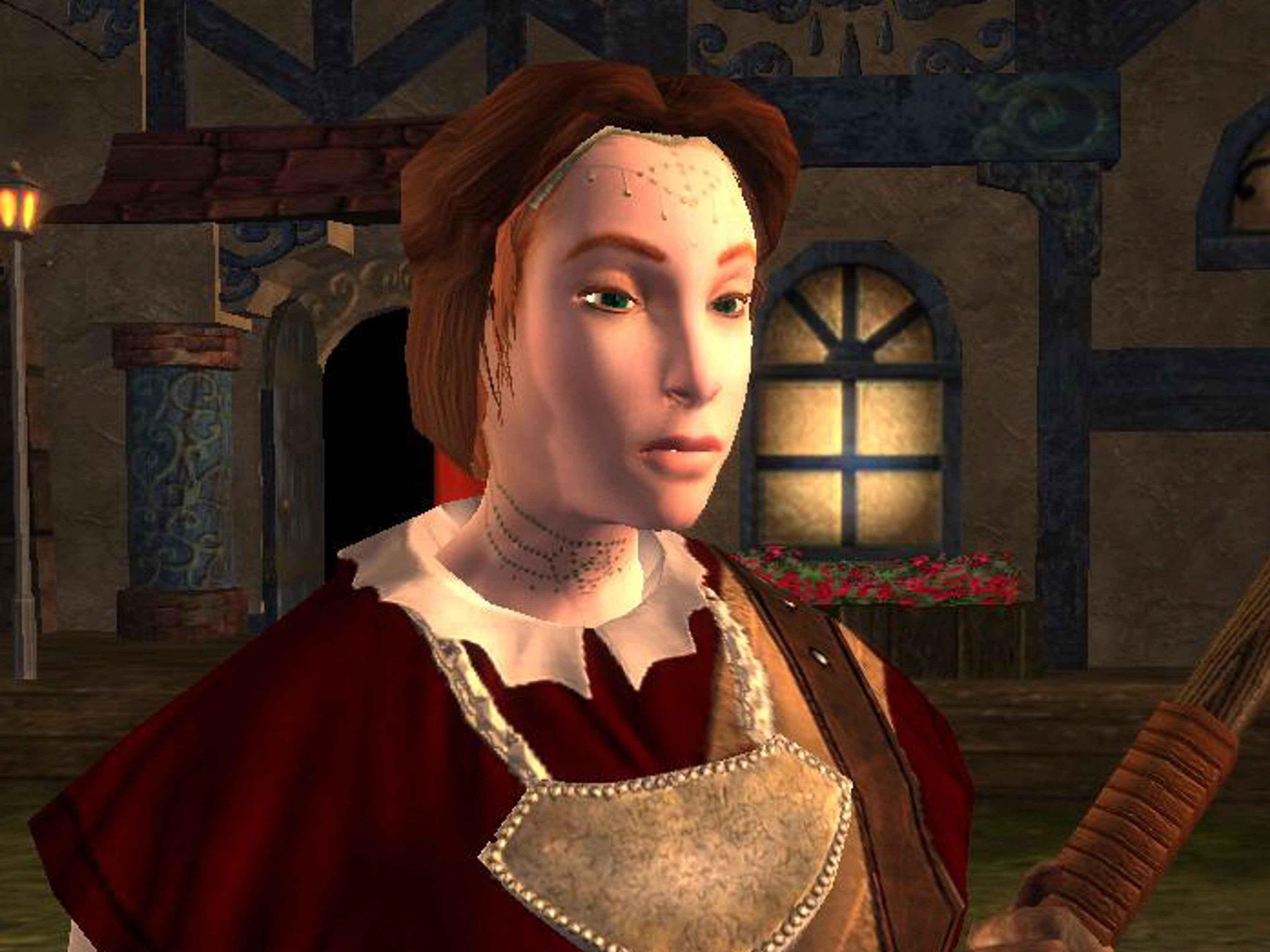 A young female sorceress with red hair and a red and gold dress, holding a magical staff or wand.