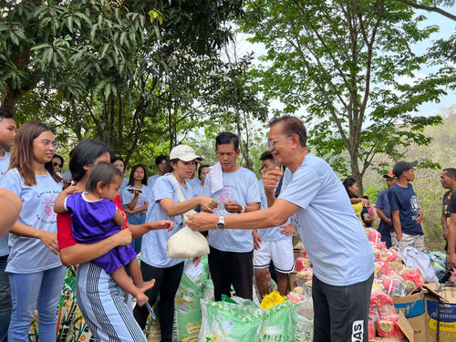 cliporg team sharing food to indigenous people