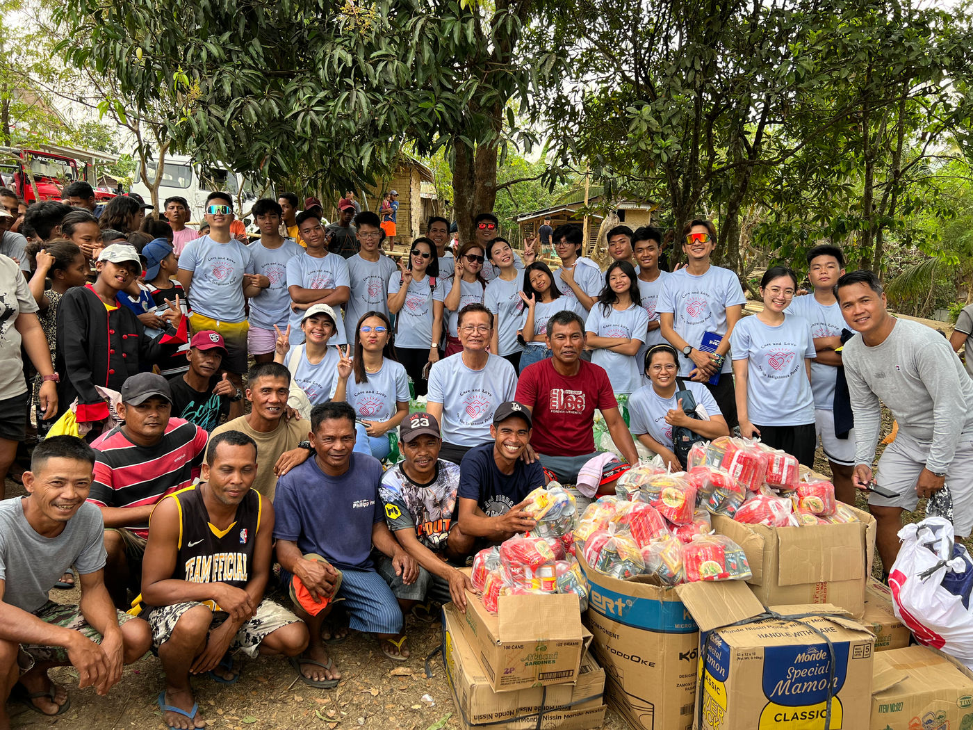 cliporg team with indigenous people and food donations