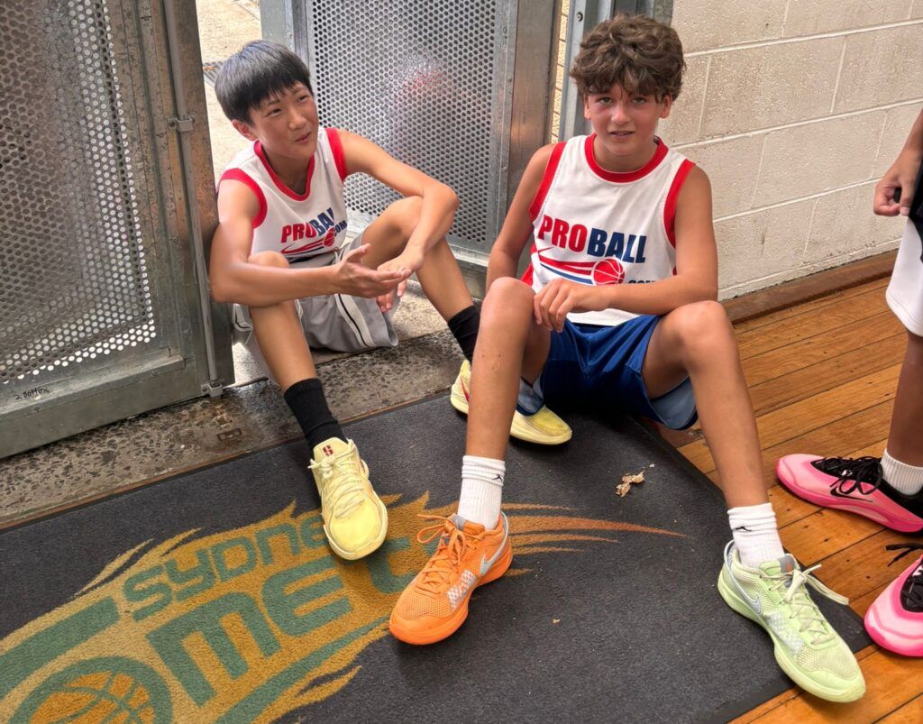 Young basketball players from across Sydney competing in a ProBall Streetball event, showing high-energy games, teams from Mount Druitt and North Sydney, and a full gym of kids playing competitive basketball.