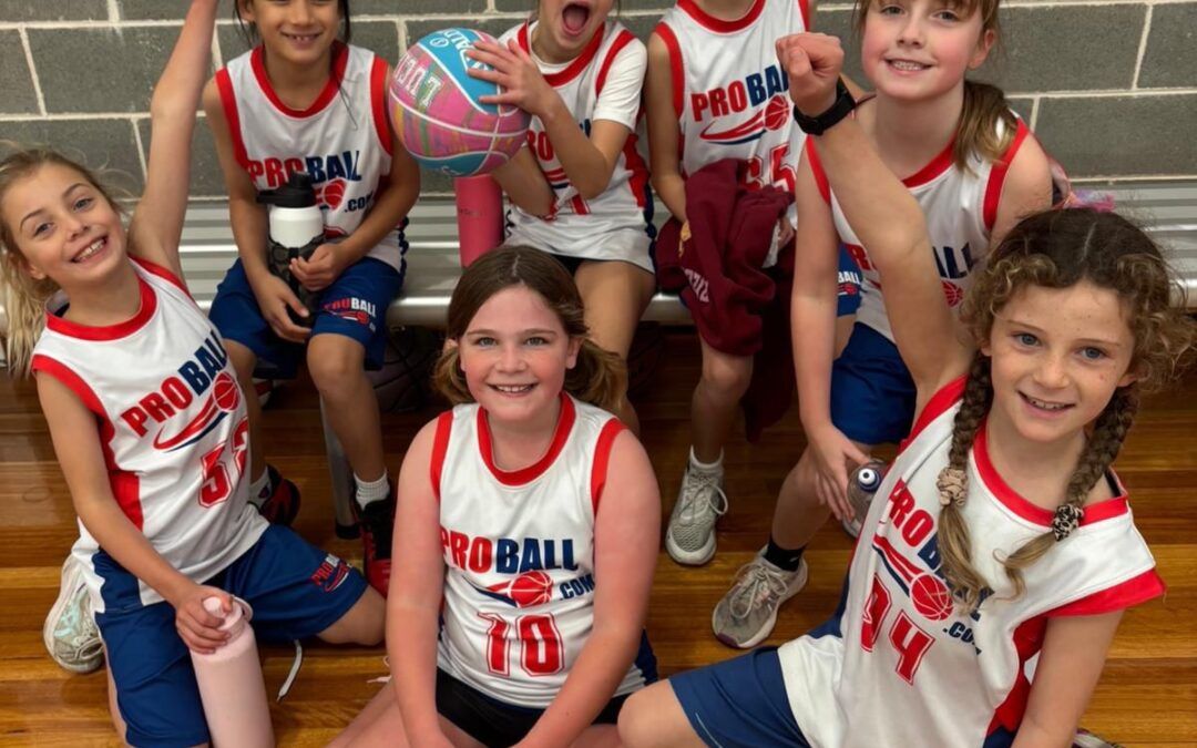 Youth basketball player demonstrating athlete positive mindset during a competitive basketball game.