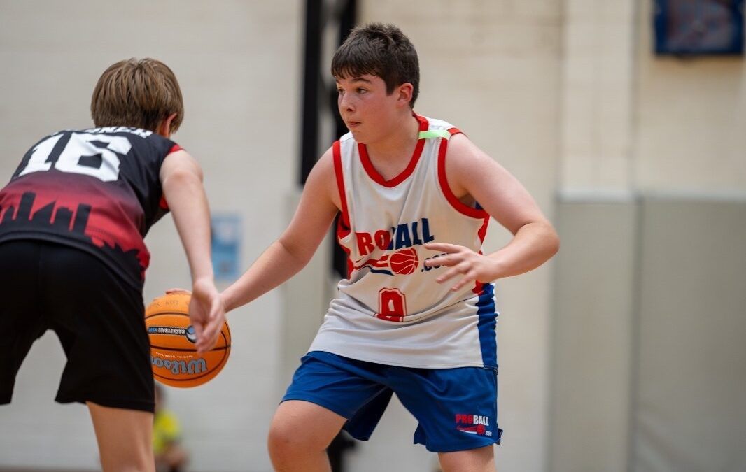 young basketball athlete training with focus showing mindset consistency and development in youth basketball session