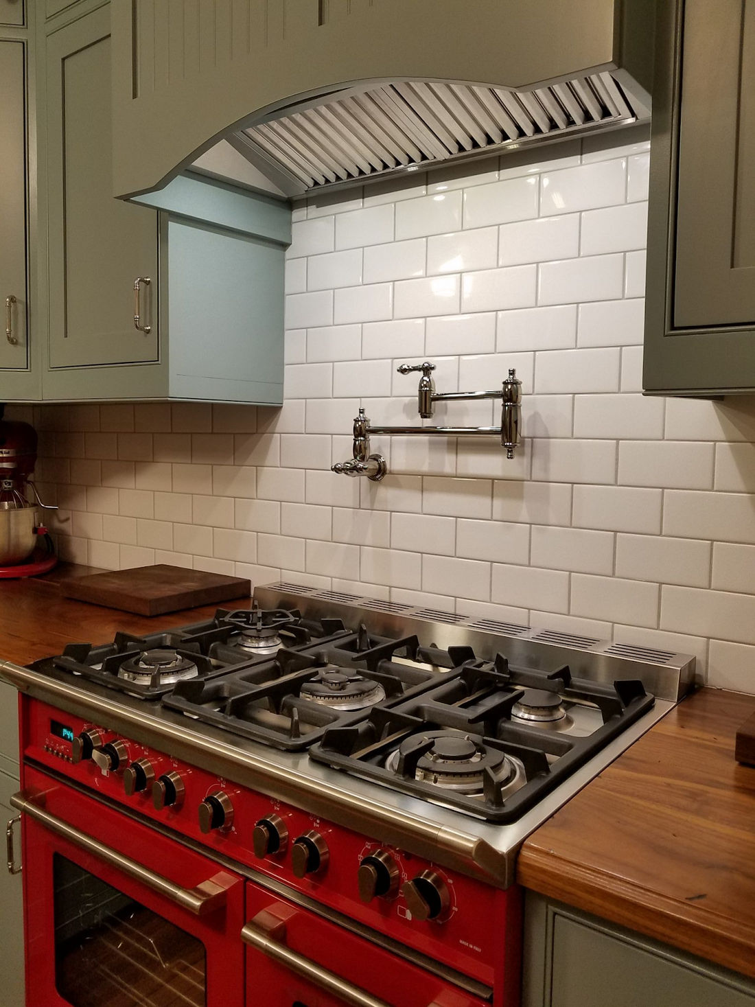 Kitchen range hoods are for all kitchens, not just above gas ovens -  Structure Tech Home Inspections