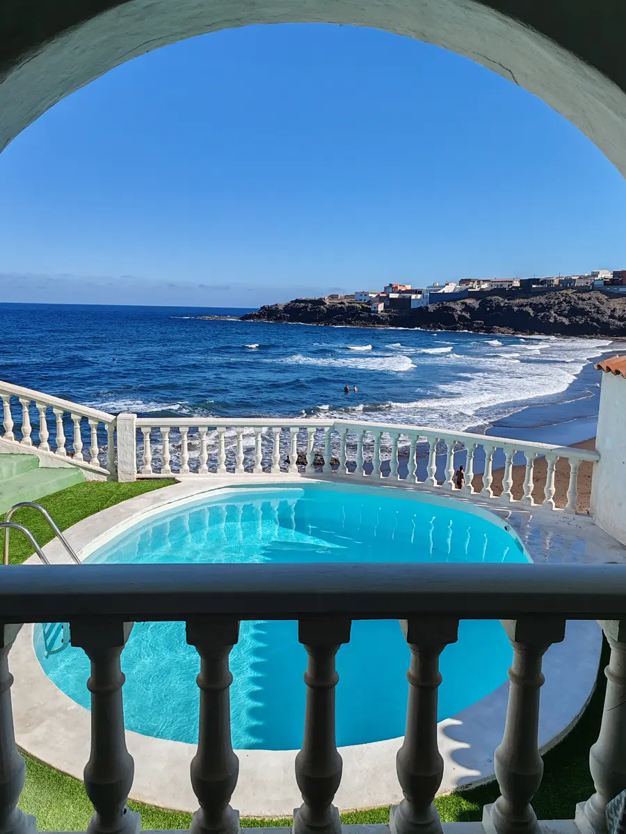 Modern bedroom with mountain view at Padel Camp ocean front villa in Gran Canaria