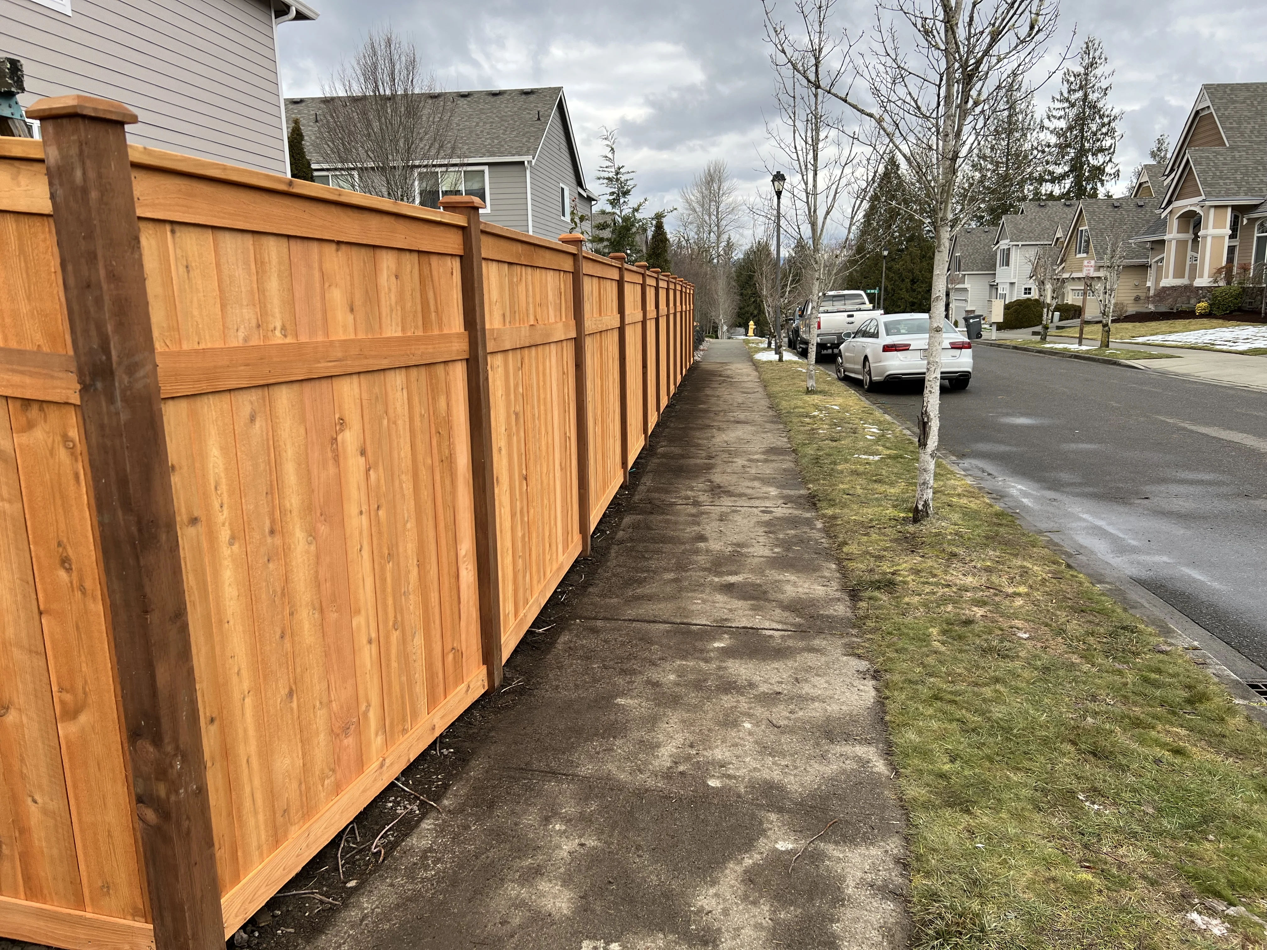 Cedar 3-rail picture frame fence installation in Seattle