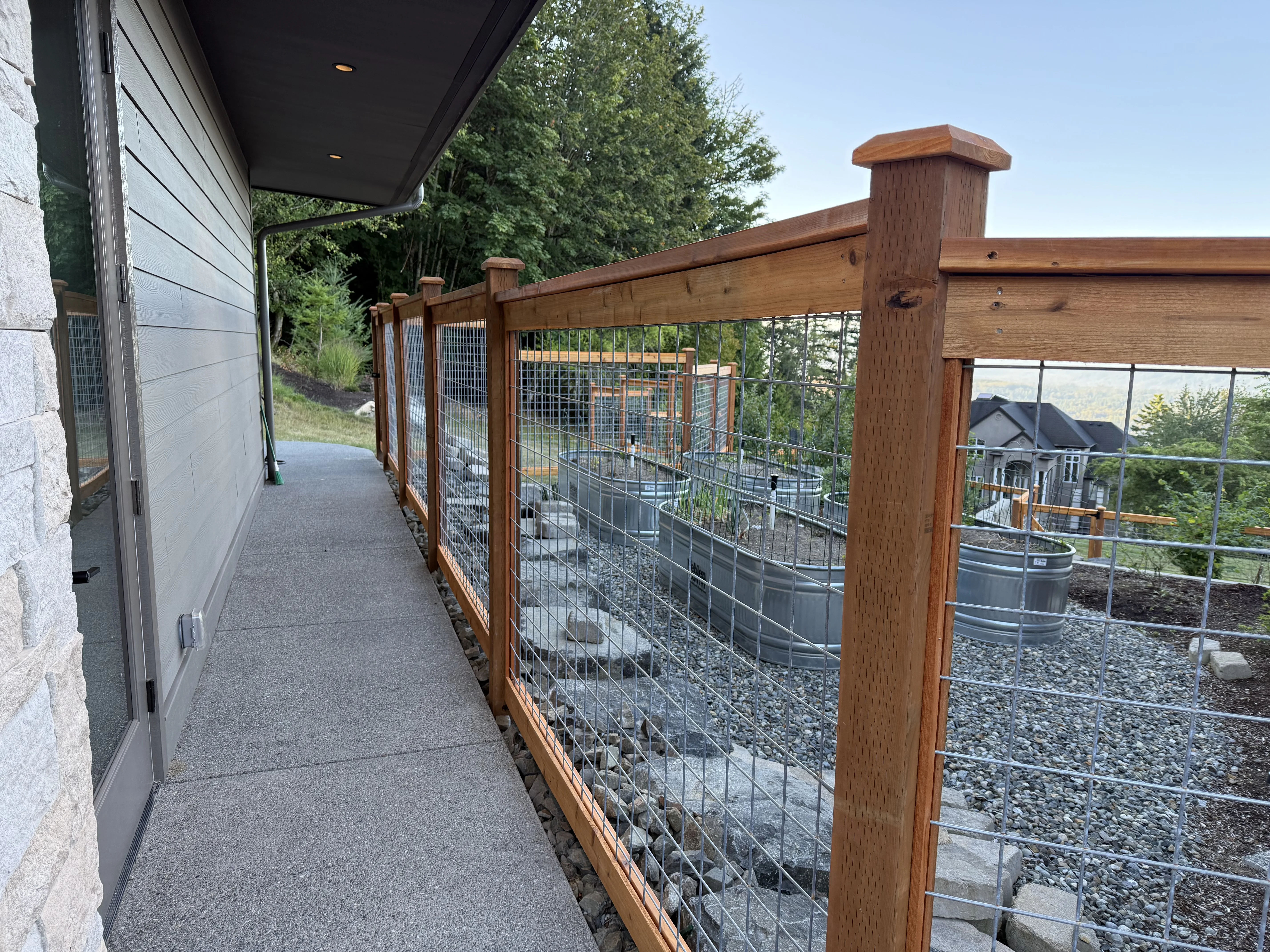 Galvanized hogwire fence panels showing wire mesh construction detail