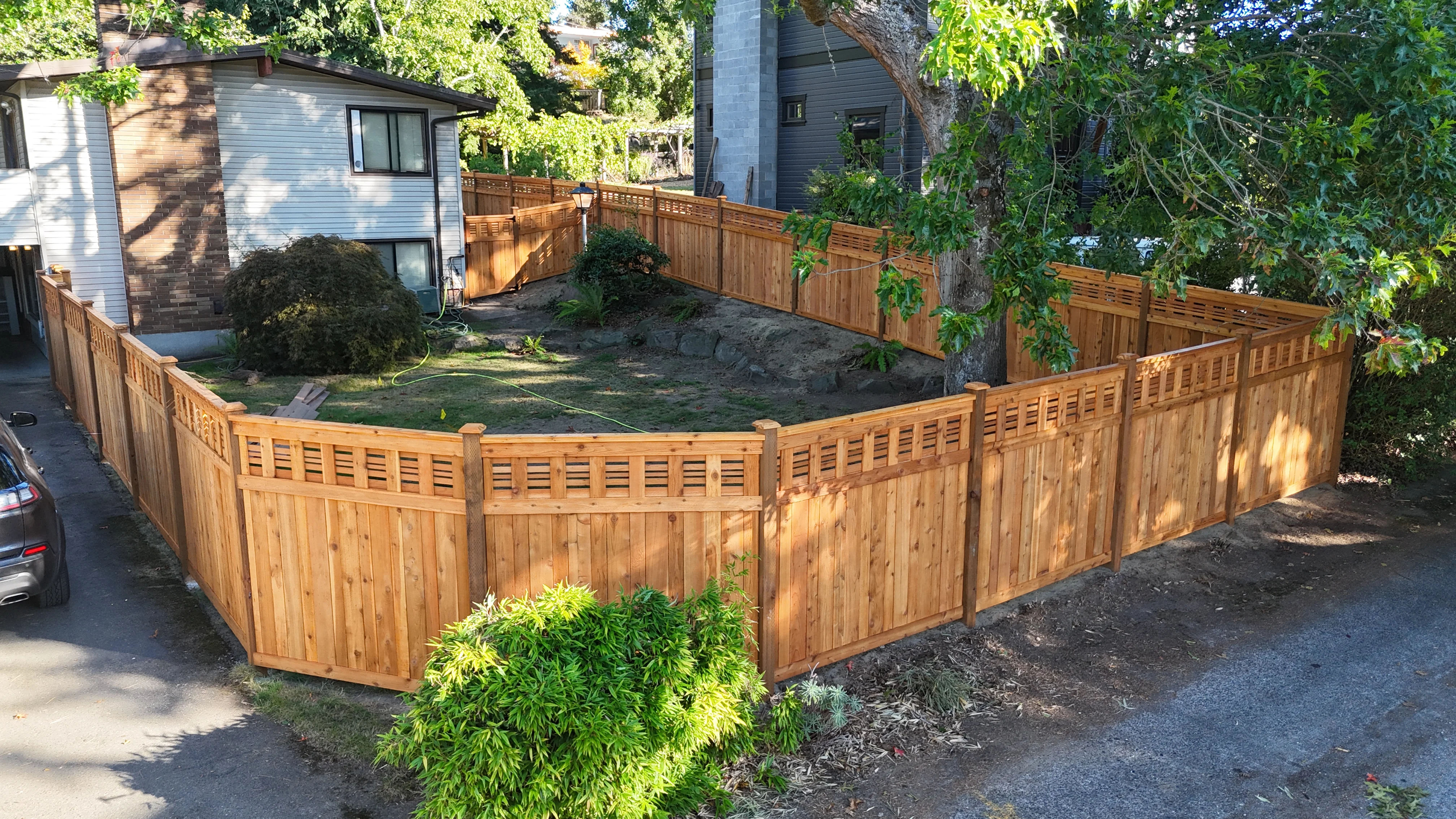 Long run of horizontal lattice fence showing stainless steel construction