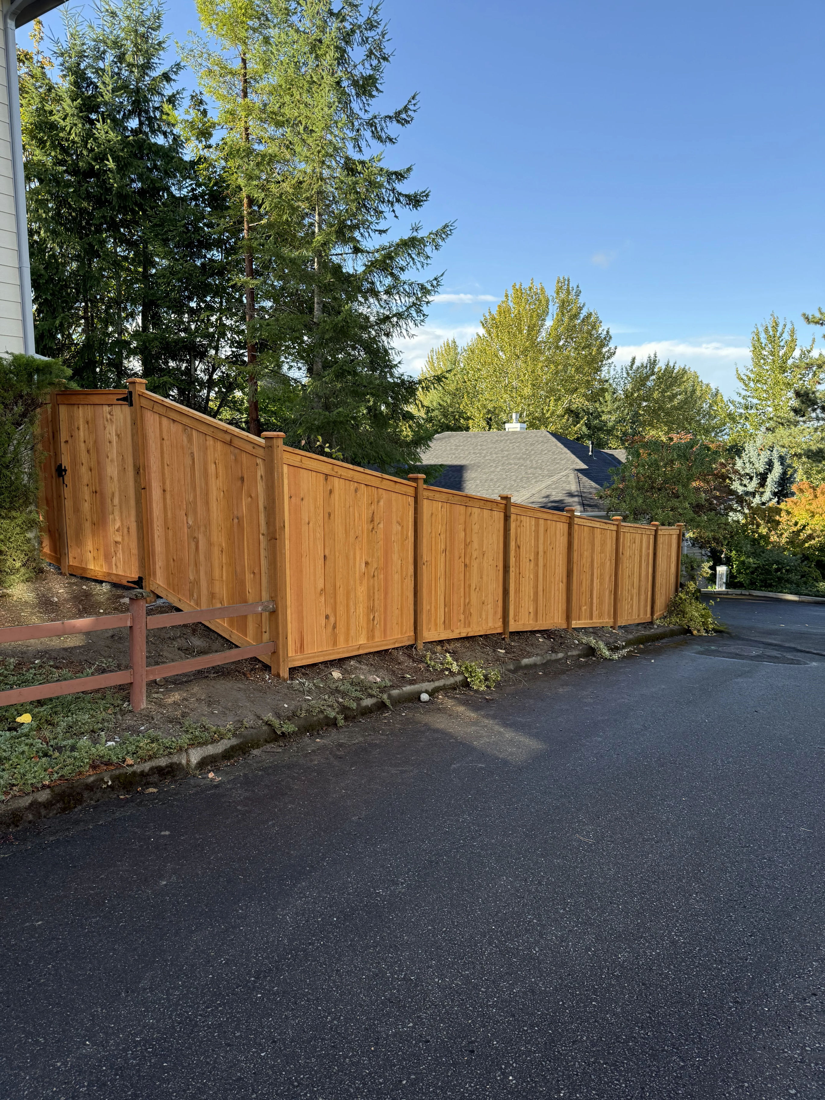 Close-up of picture frame fence trim construction