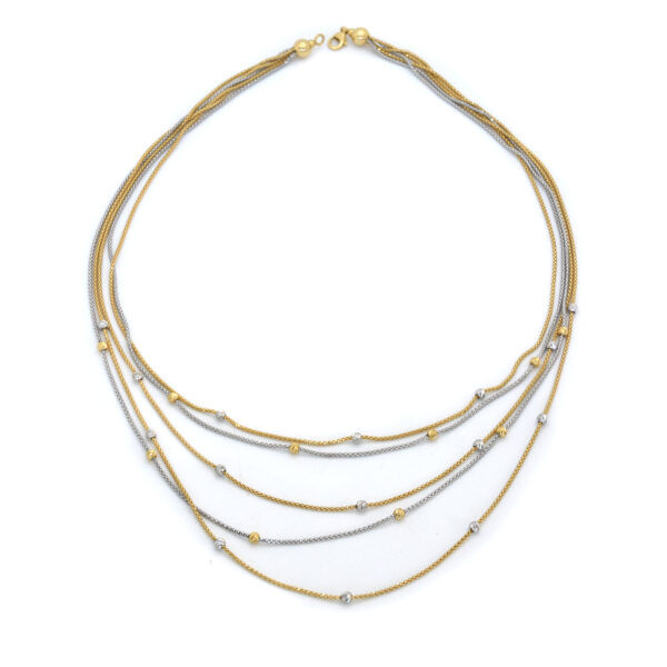 Collana a fili in oro bianco e giallo 18 kt.