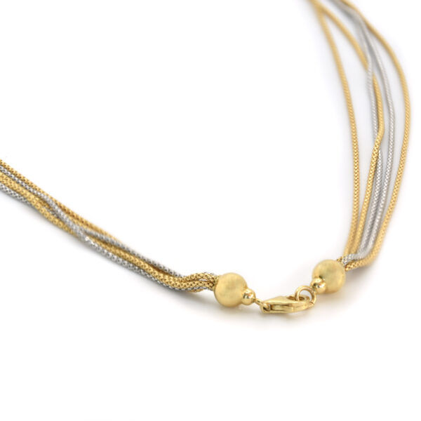 Collana a fili in oro bianco e giallo 18 kt.