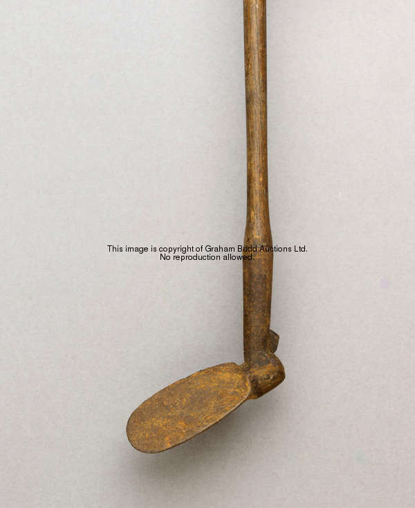 An Urquhart adjustable club, circa 1905, hickory shaft, mechanism in need of releasing