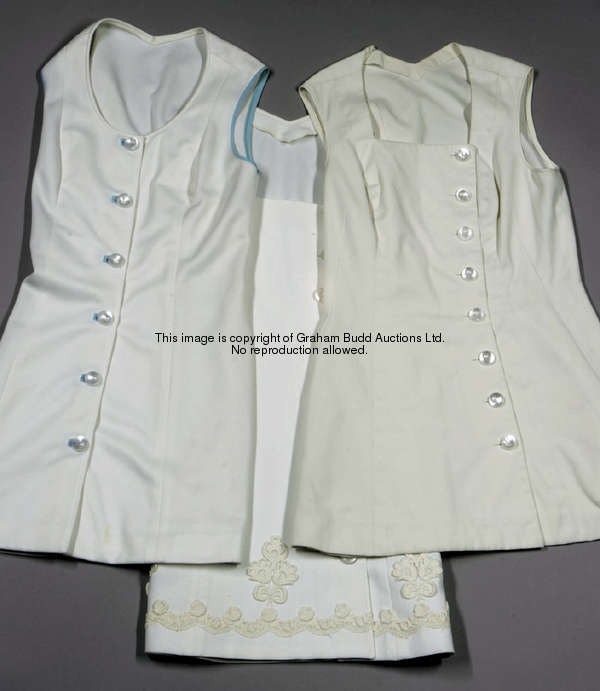 Three Christine Truman tennis dresses by Teddy Tinling, all white sleeveless button-up dresses, one ...