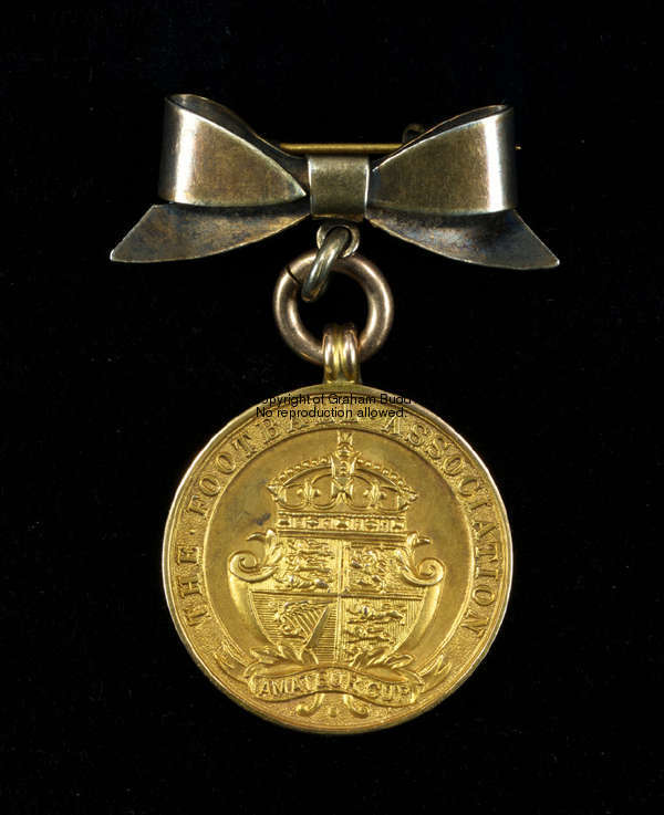 A 9ct. gold F.A Amateur Cup winner's medal, 1937-38, inscribed THE FOOTBALL ASSOCIATION AMATEUR CUP,...