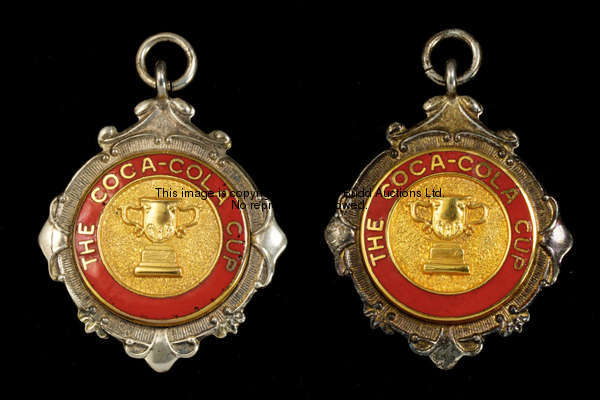 Two silver & enamel Coca-Cola Cup runners-up medals, 1995-96, both inscribed THE COCA-COLA CUP, RUNN...