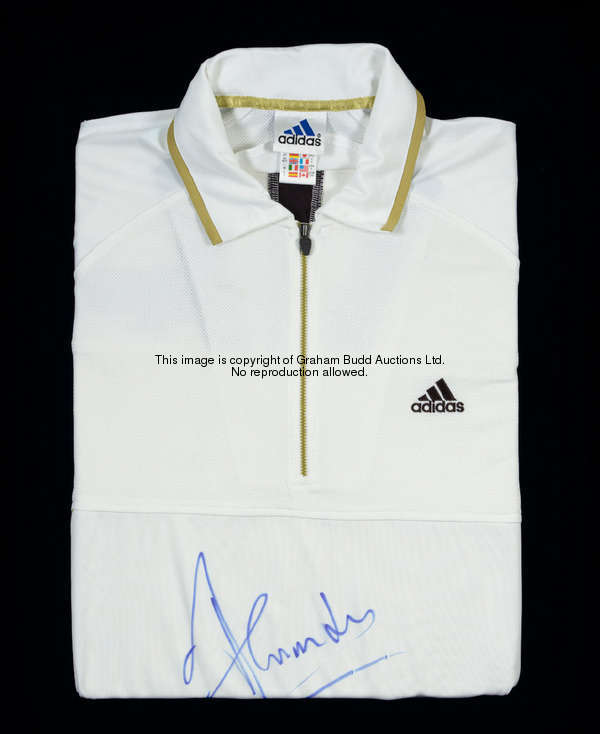 A signed Tim Henman tournament tennis shirt, boldly signed in blue marker pen to front, sponsor's fl...