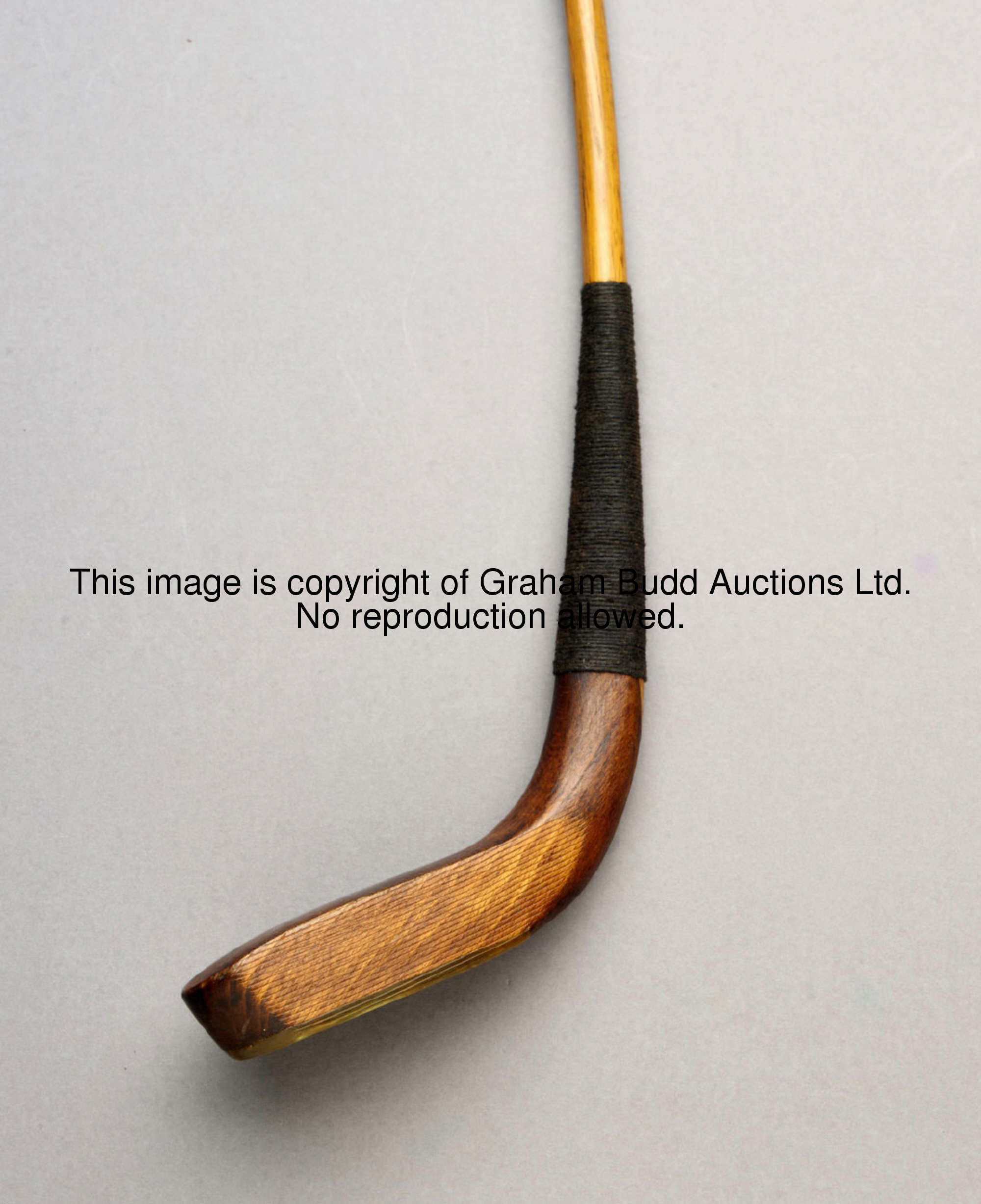 A Peter Paxton, Musselburgh, long nosed putter, circa 1880 beech head, hickory shaft additionally st...