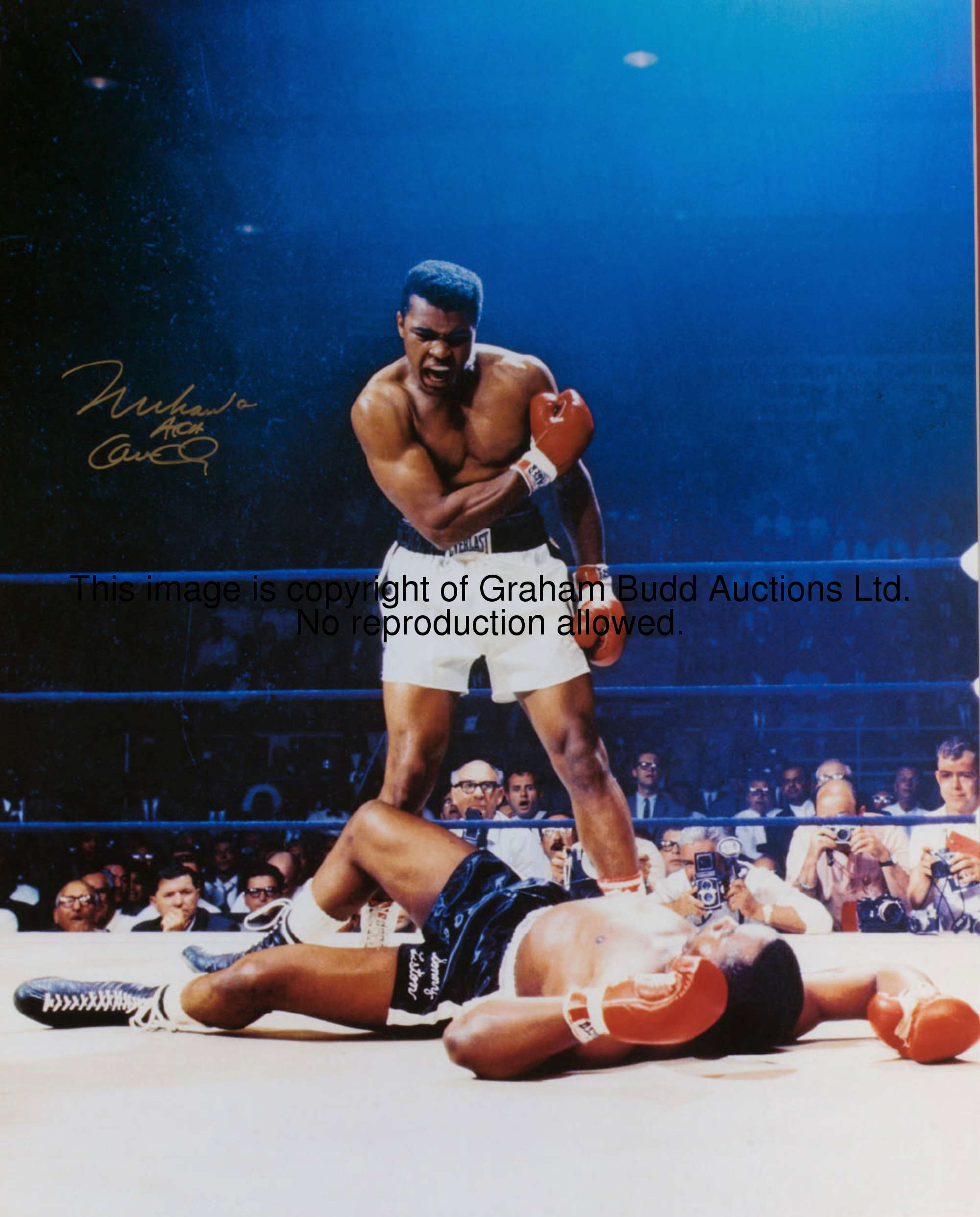 A signed photograph of Muhammad Ali, a colour action photograph form the Liston fight, signed in gol...