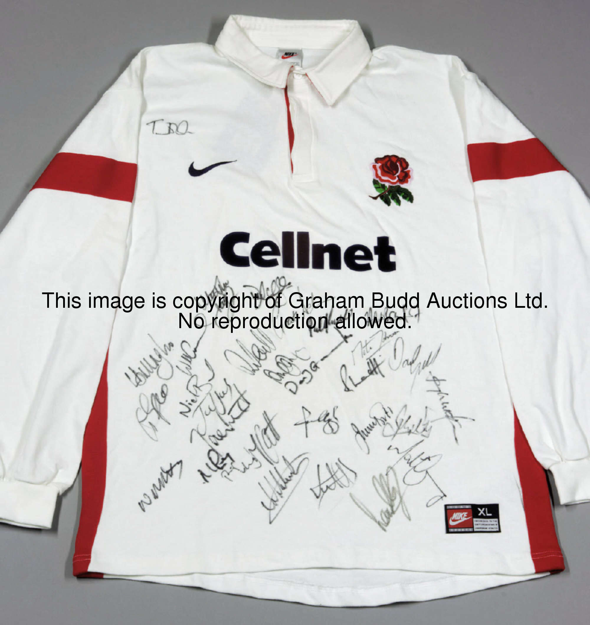An England rugby shirt signed by the 1999 World Cup squad, approximately 29 signatures in black mark...