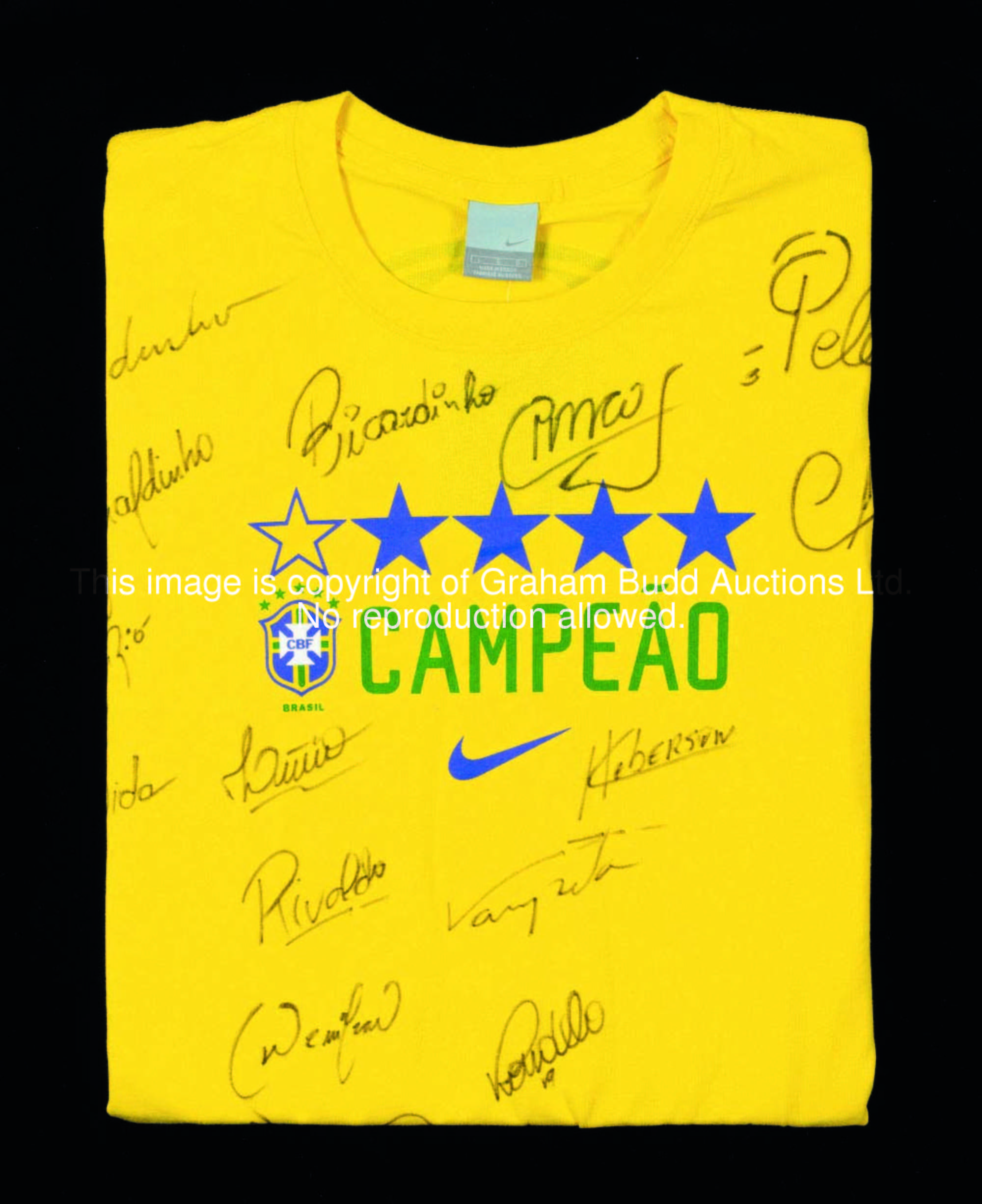 A Brazil '5-star' souvenir jersey signed by 19 members of the 2002 World Cup winning squad plus Pele...