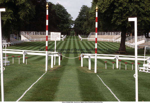 The Weighing Room exit barber poles, red & white hooped wooden poles with gilt finials, 396cm., 156i...