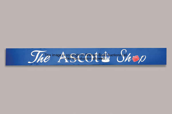 The Ascot Shop frontage signs, a pair of large blue painted metal shop signs, set with white acrylic...