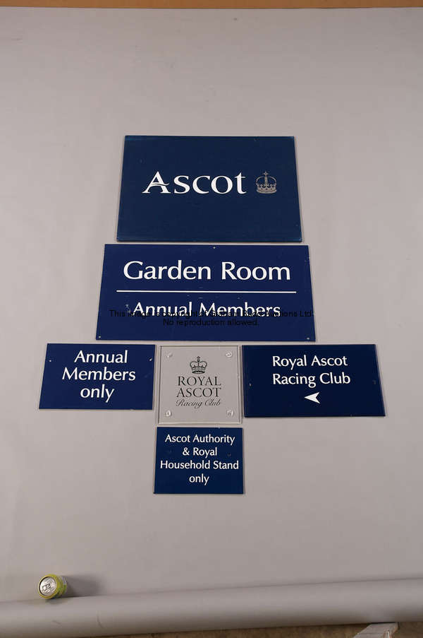 An Ascot logo board, blue painted wood, 56 by 76cm., 22 by 30in.