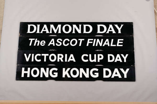 The Ascot Finale, black painted wooden Spagnoletti raceday board with white lettering, 25.5 by 100cm...