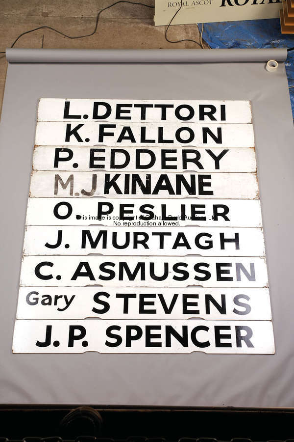 K. Fallon, white painted wooden Spagnoletti jockey board with black lettering, 25.5 by 100cm., 10 by...