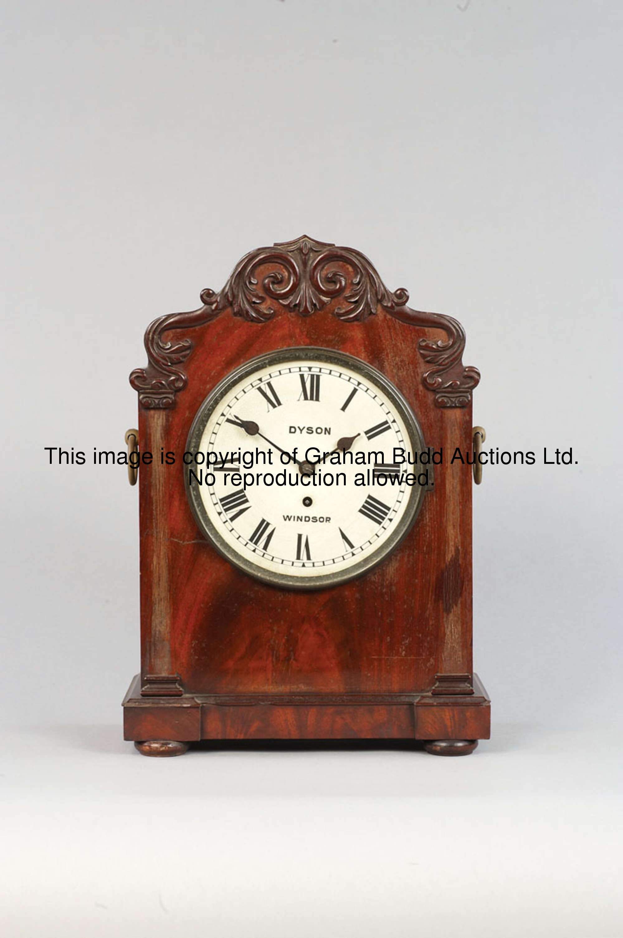 The Weighing Room clock: a mahogany mantel timepiece by Dyson of Windsor, circa 1850, 7 1/2in. paint...