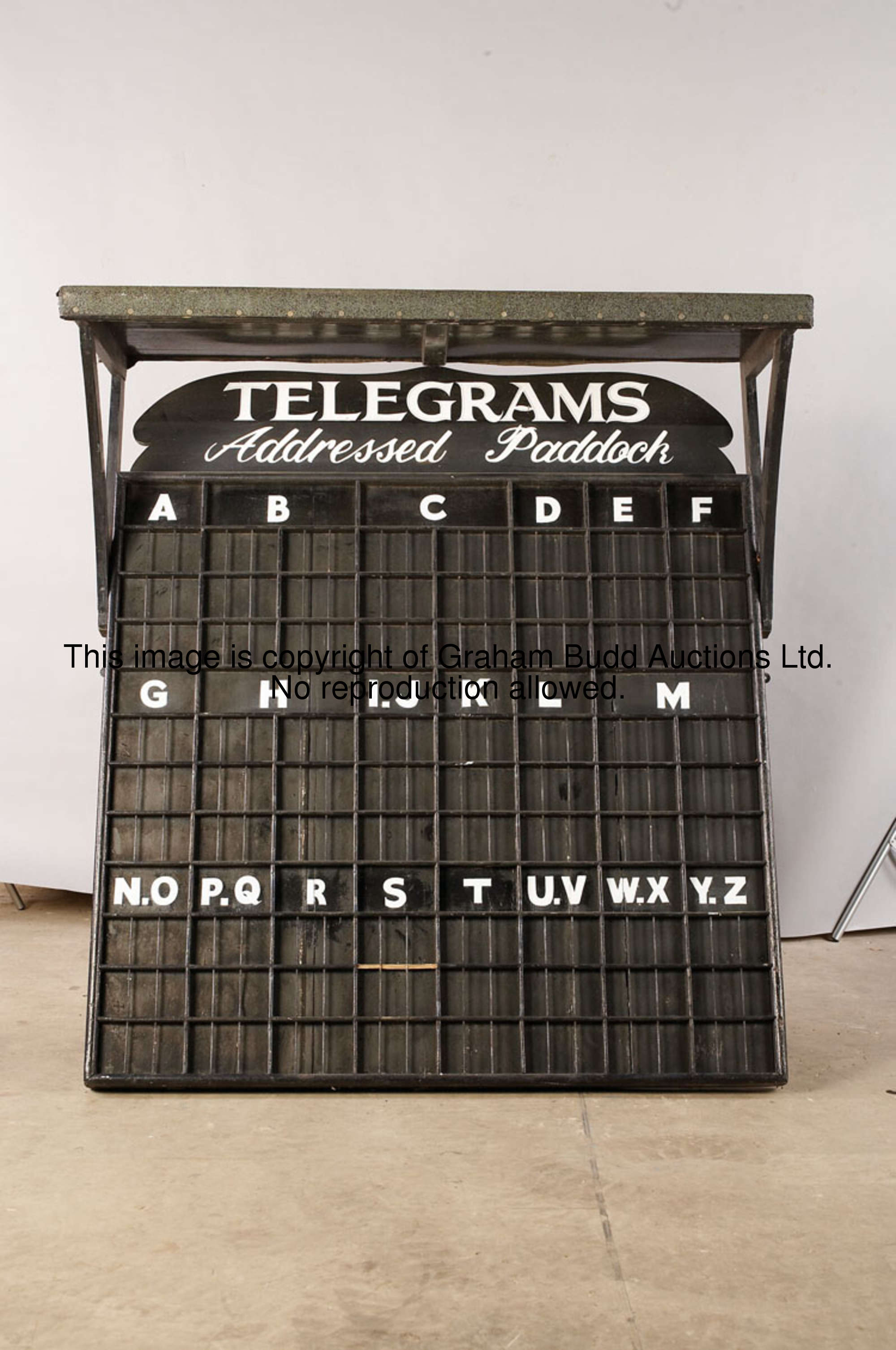 The Racecourse Paddock Telegrams Board, early 20th century, the varnished wooden board surmounted by...