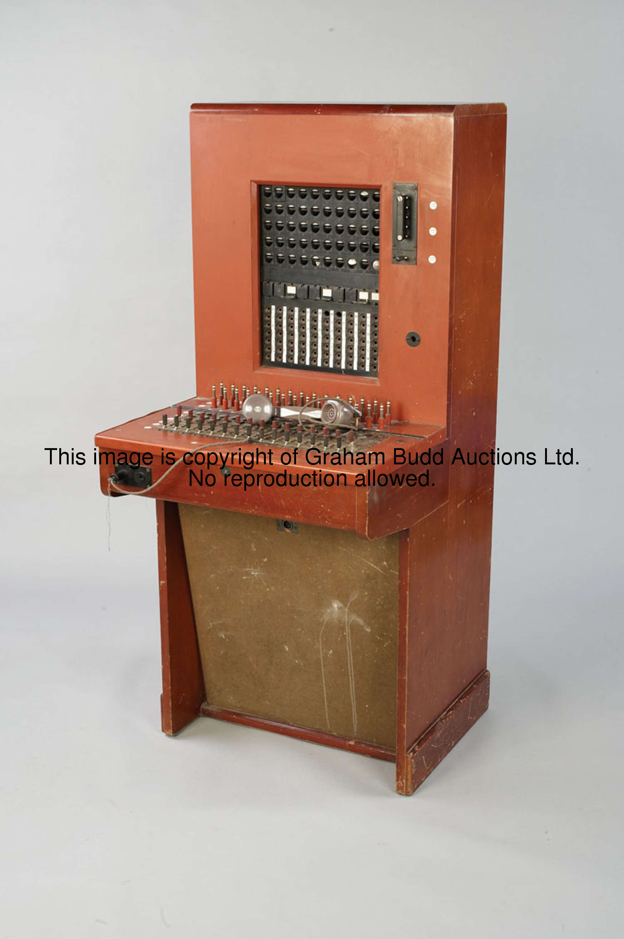 The Racecourse Telephone Switchboard, the 50 line capacity mechanism within a varnished wood housing...