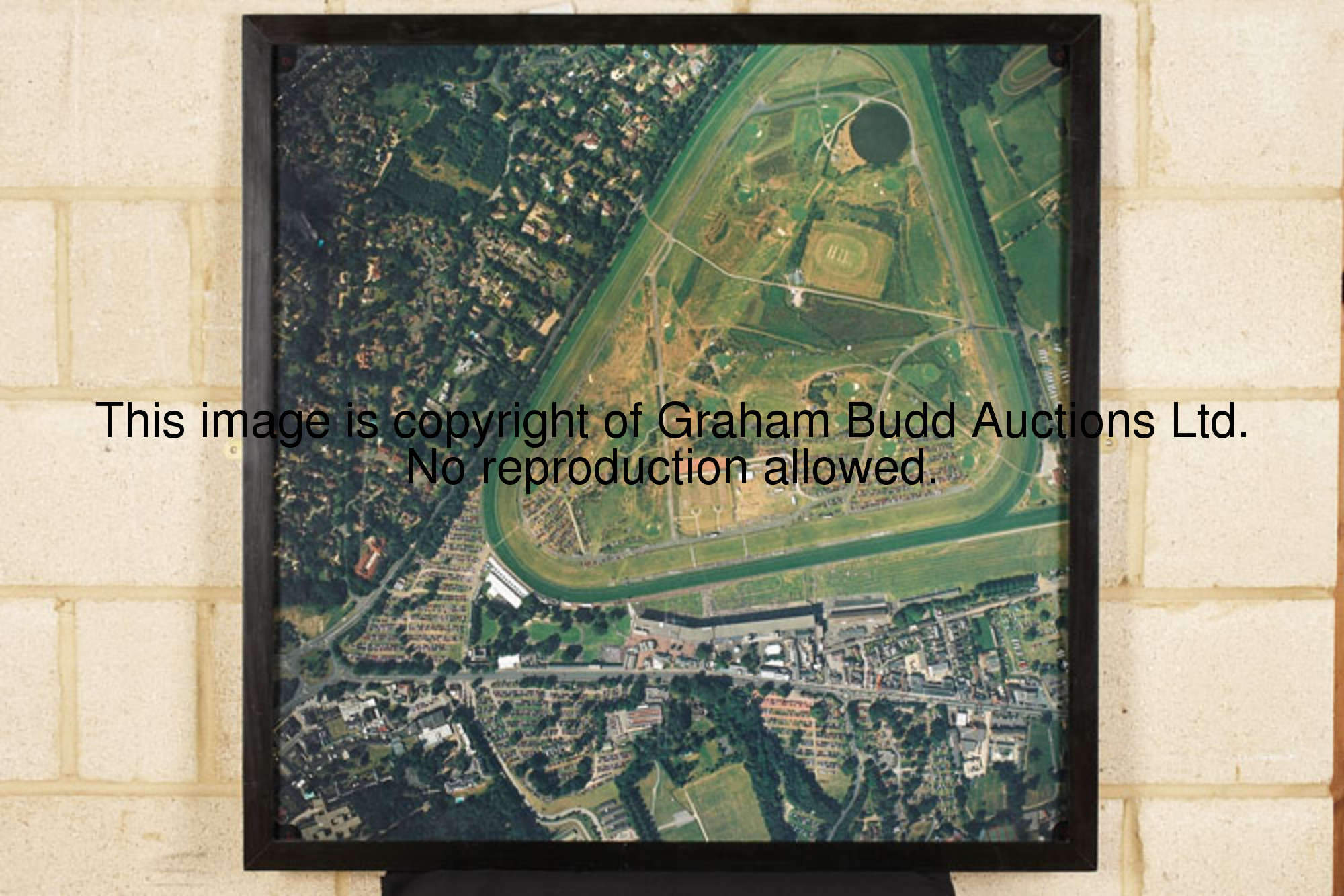 A colour aerial photograph of Ascot Racecourse, framed & glazed, 96cm., 37 3/4in. square
