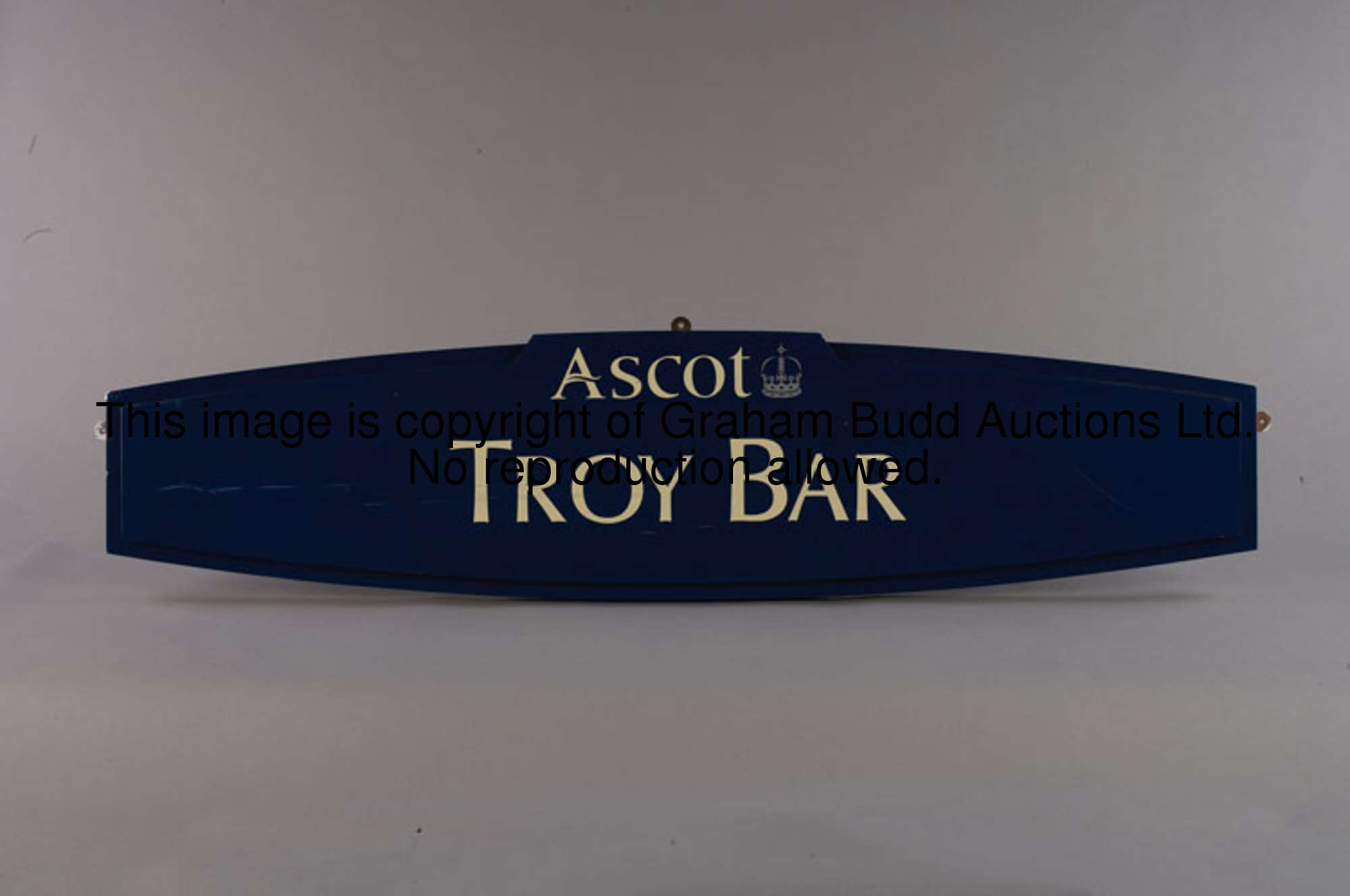 Troy Bar, a blue painted wooden bar sign, bearing Ascot logo, white lettering, 35 by 150cm., 13 3/4 ...