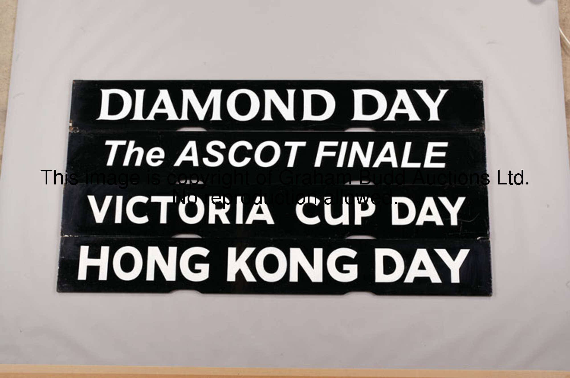 Diamond Day, black painted wooden Spagnoletti raceday board with white lettering, 25.5 by 100cm., 10...