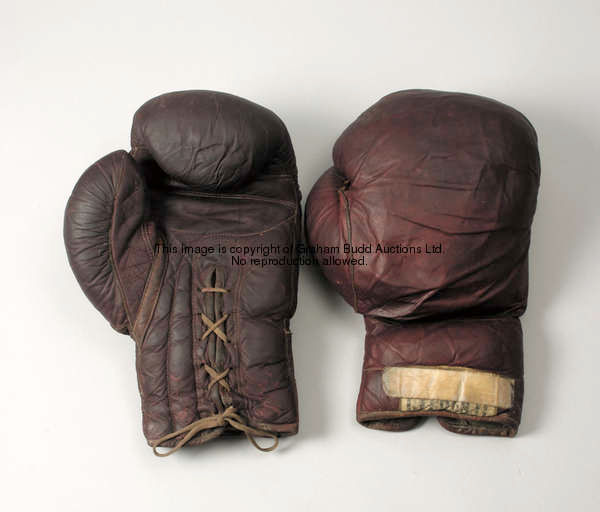 The boxing gloves worn by Joe Louis in the 1948 Earl's Court Champions in Action Exhibition, a pair ...