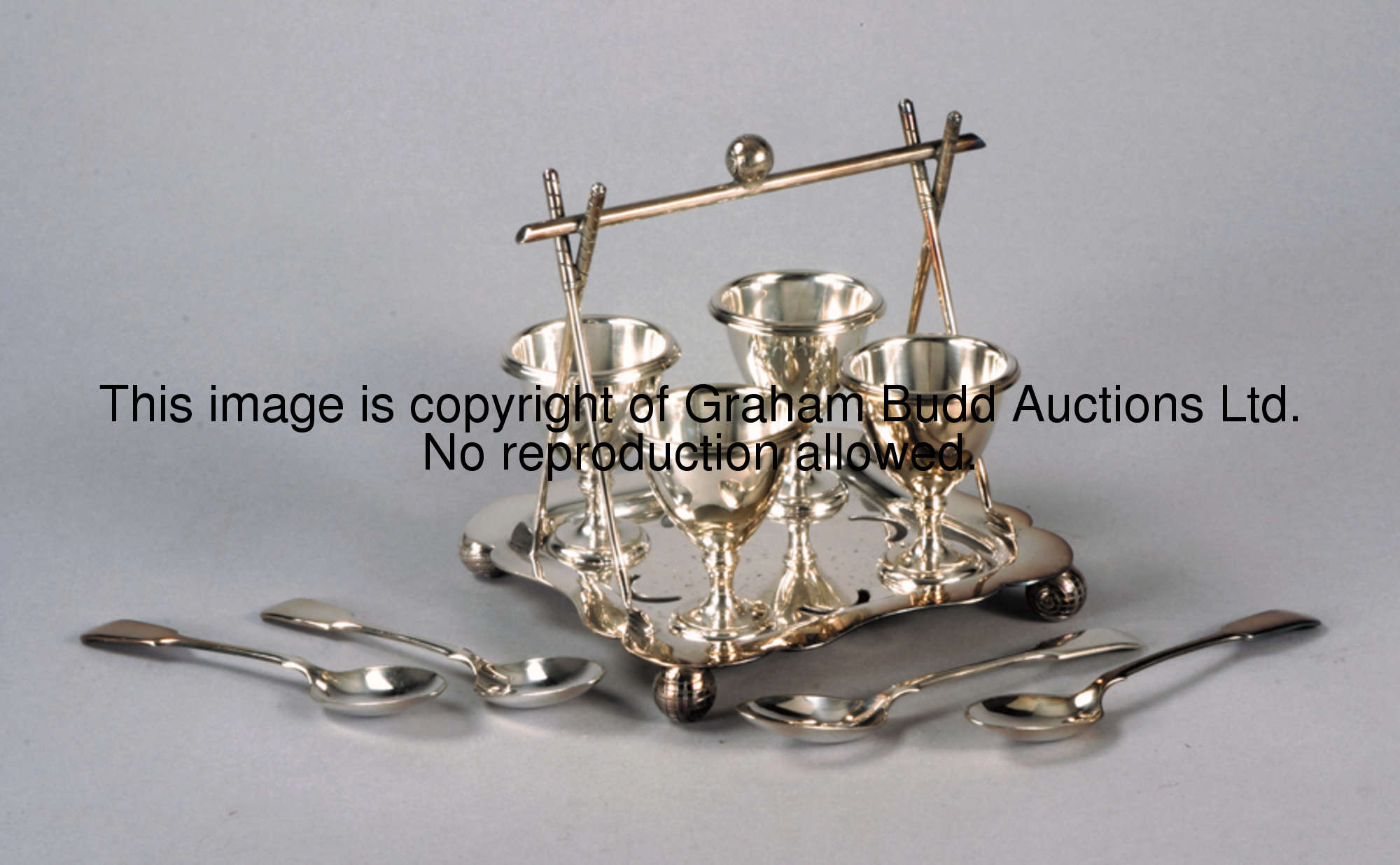 A Walker & Hall, Sheffield, silver plated golfing egg cups & spoons set, registration mark 257811, t...