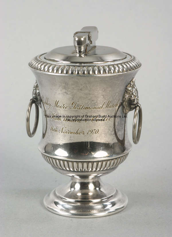 An official presentation from the Bobby Moore Testimonial Match, in the form of a silver plated tabl...
