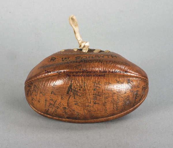 Rugby Football: a miniature leather rugby ball signed by the Welsh international XV v Scotland in 19...