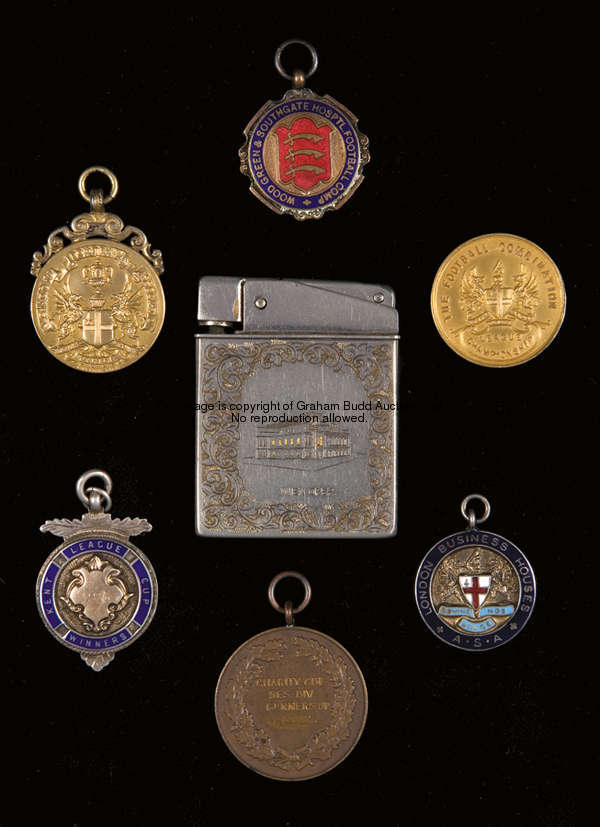 A group of seven medals, comprising: two silver-gilt Football Combination League Championship medals...