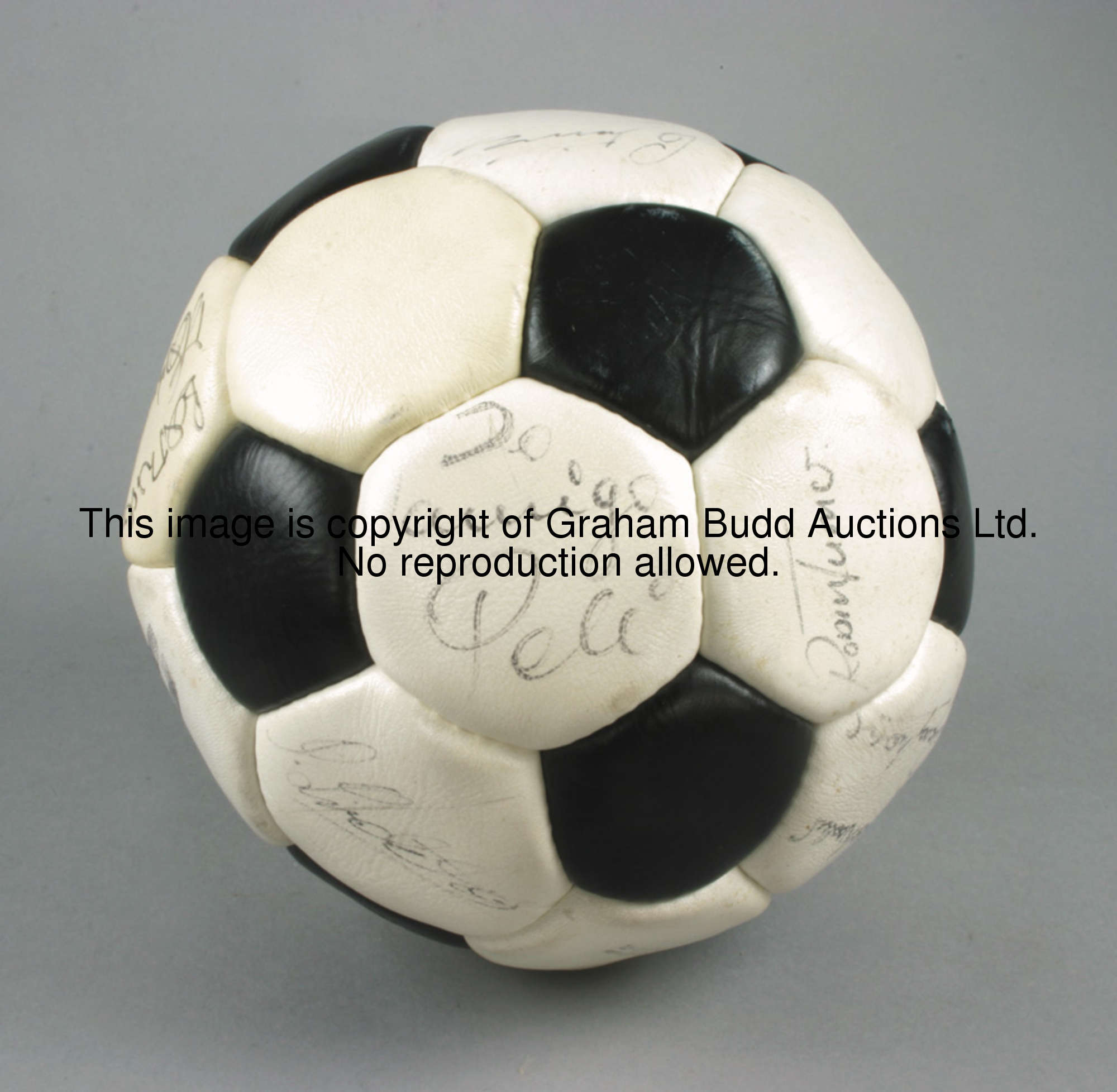 A football signed by 14 members of the cast of the 1981 movie Escape to Victory, signatures includin...