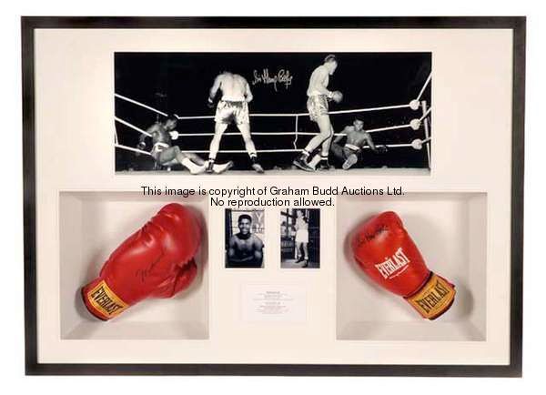 A Muhammad Ali and Sir Henry Cooper signed gloves presentation, the large and impressive display con...