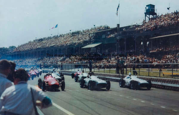 An unusually large colour photograph of the start of the 1955 British Grand Prix at Aintree, taken f...